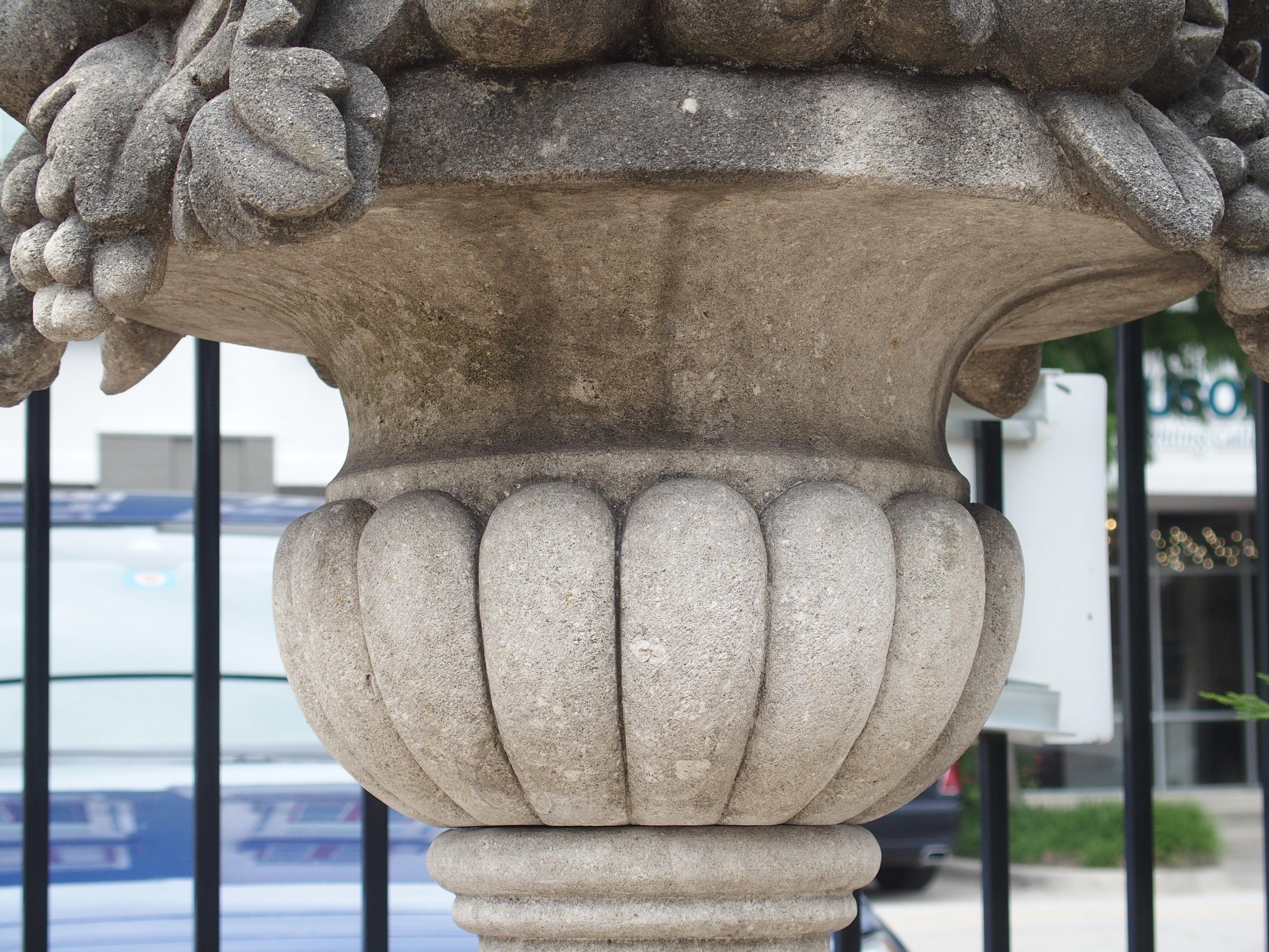 Pair of Italian Limestone Urns with Fruit and Floral Bouquets on Pedestals 5