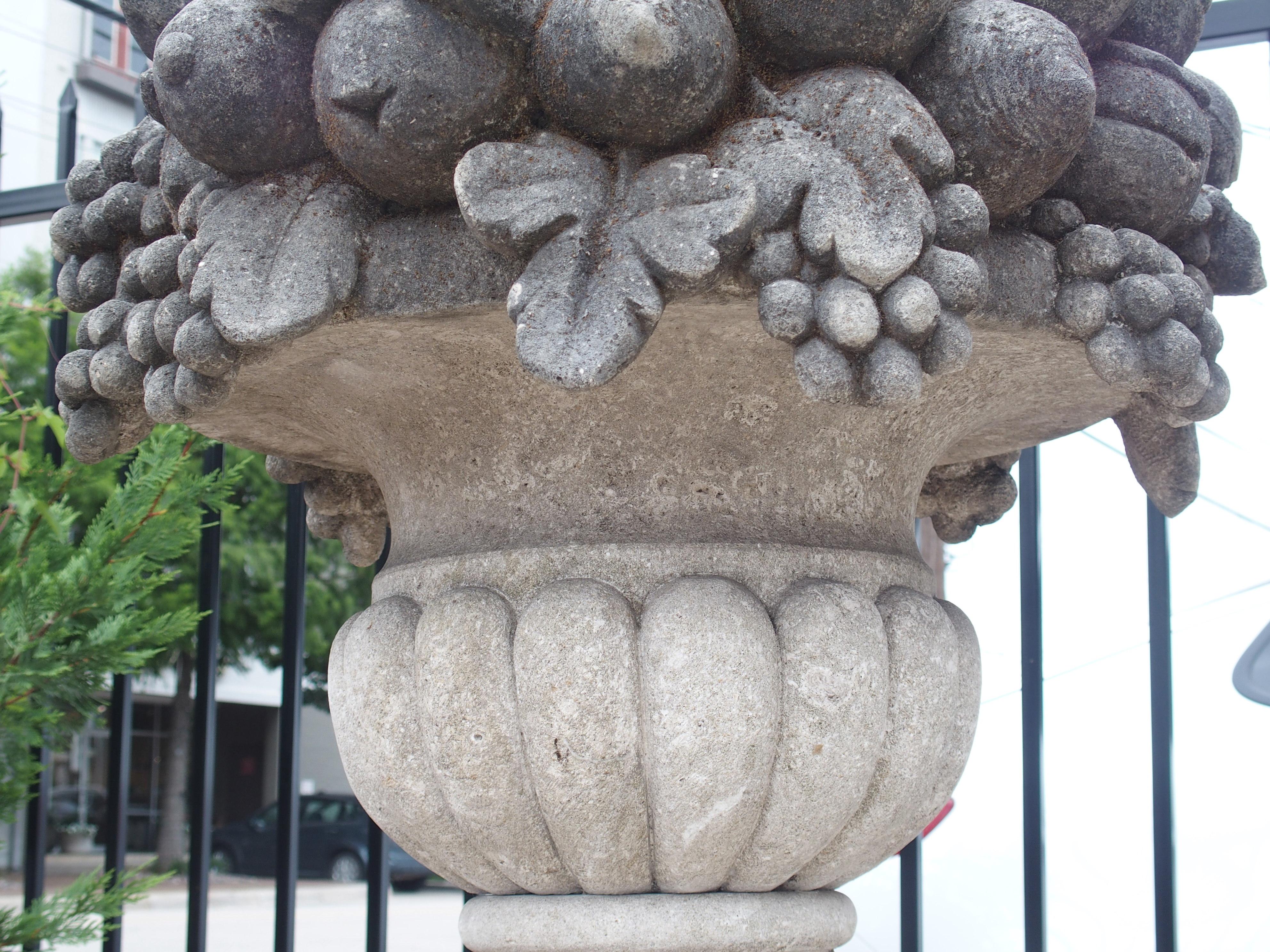 Pair of Italian Limestone Urns with Fruit and Floral Bouquets on Pedestals 6