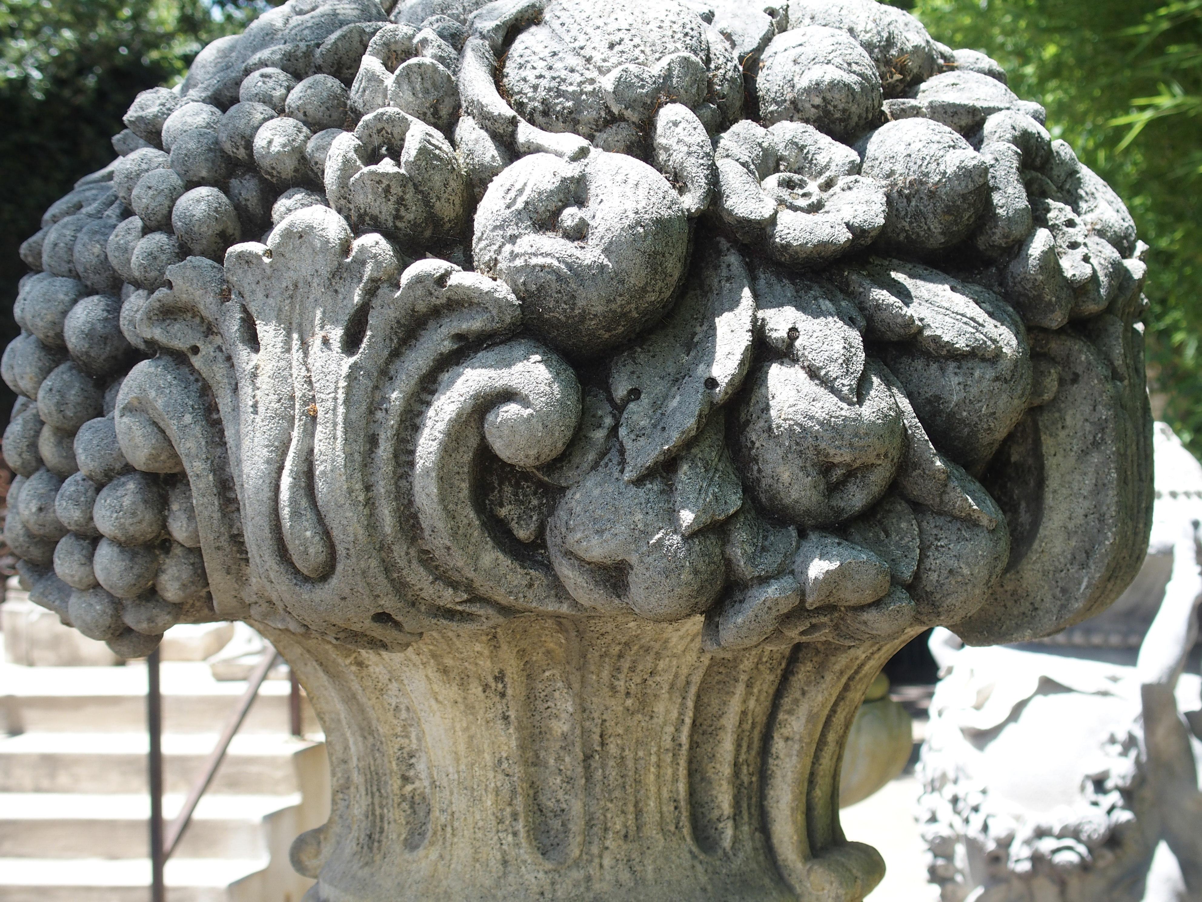 Pair of Italian Limestone Urns with Fruit and Floral Bouquets on Pedestals 7