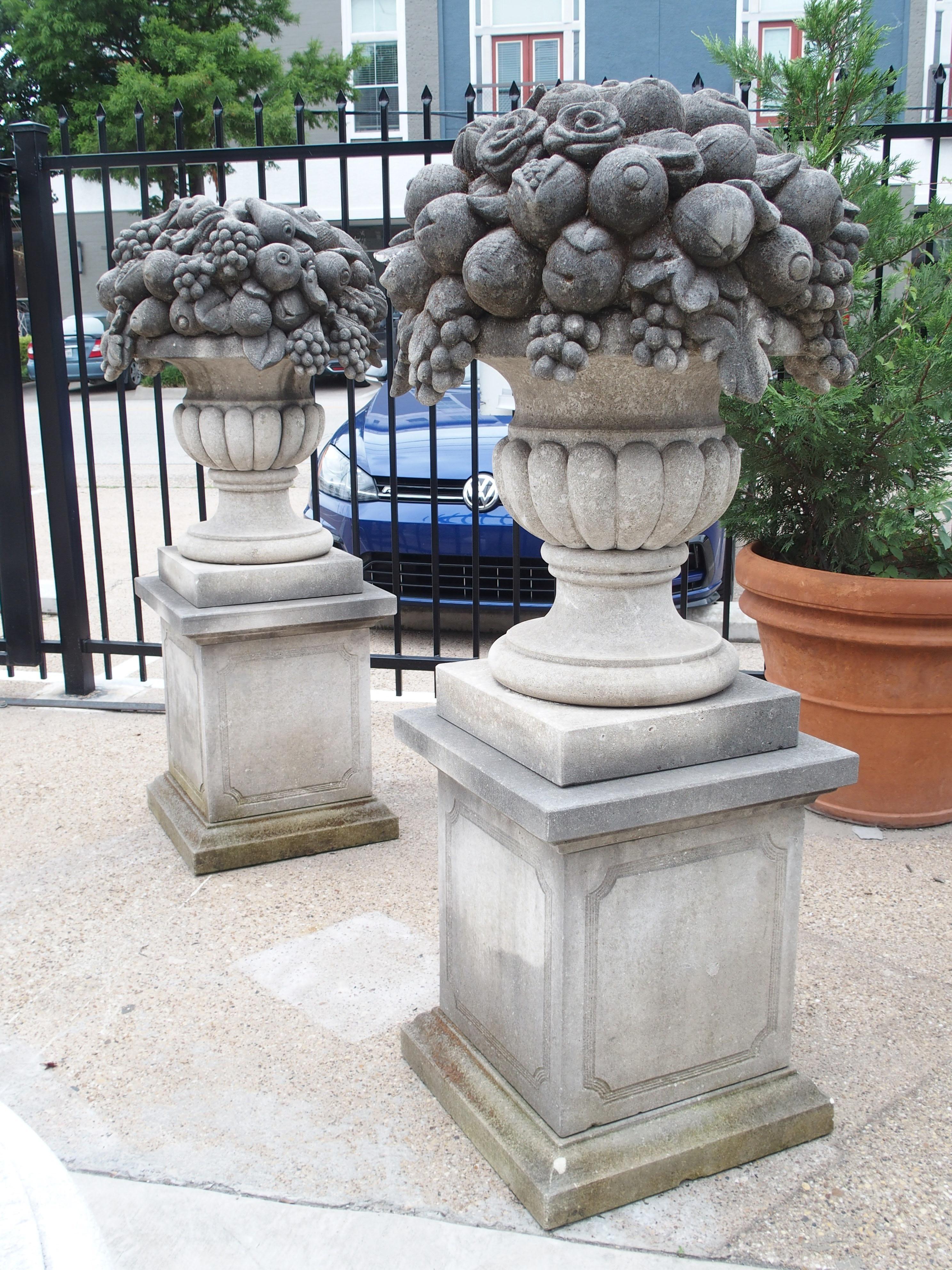 Pair of Italian Limestone Urns with Fruit and Floral Bouquets on Pedestals 7