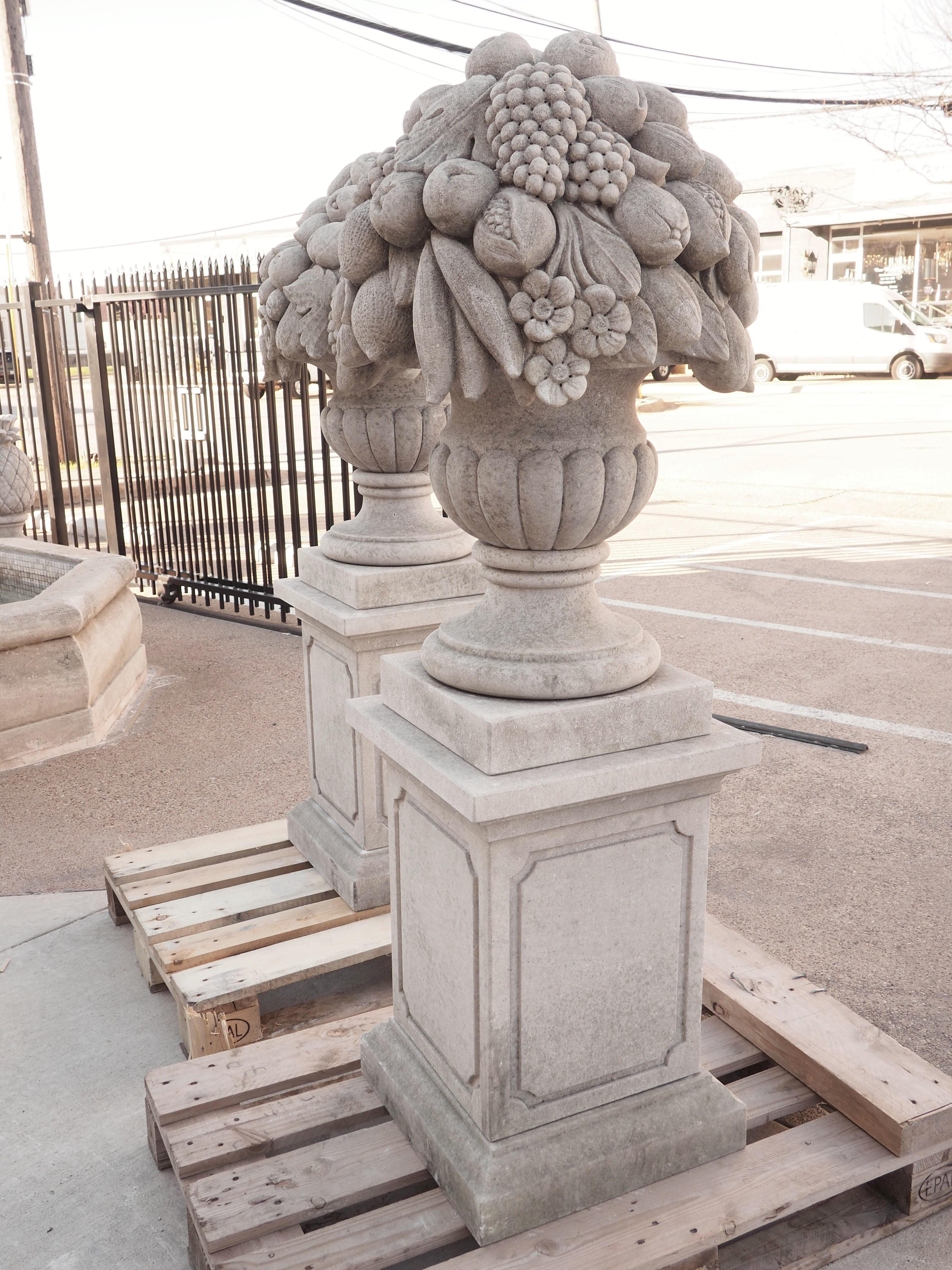 Pair of Italian Limestone Urns with Fruit and Floral Bouquets on Pedestals For Sale 11