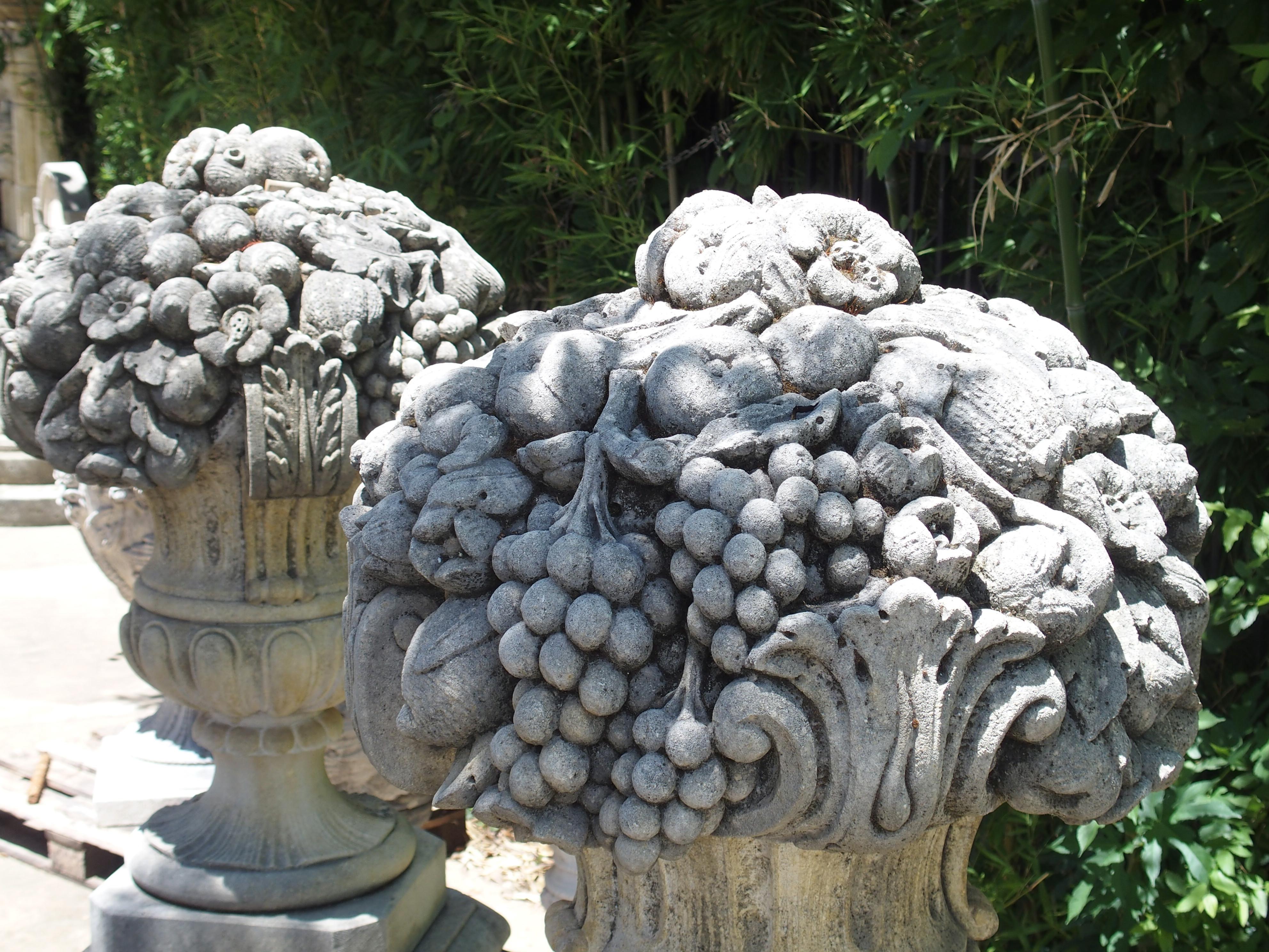 Pair of Italian Limestone Urns with Fruit and Floral Bouquets on Pedestals 12