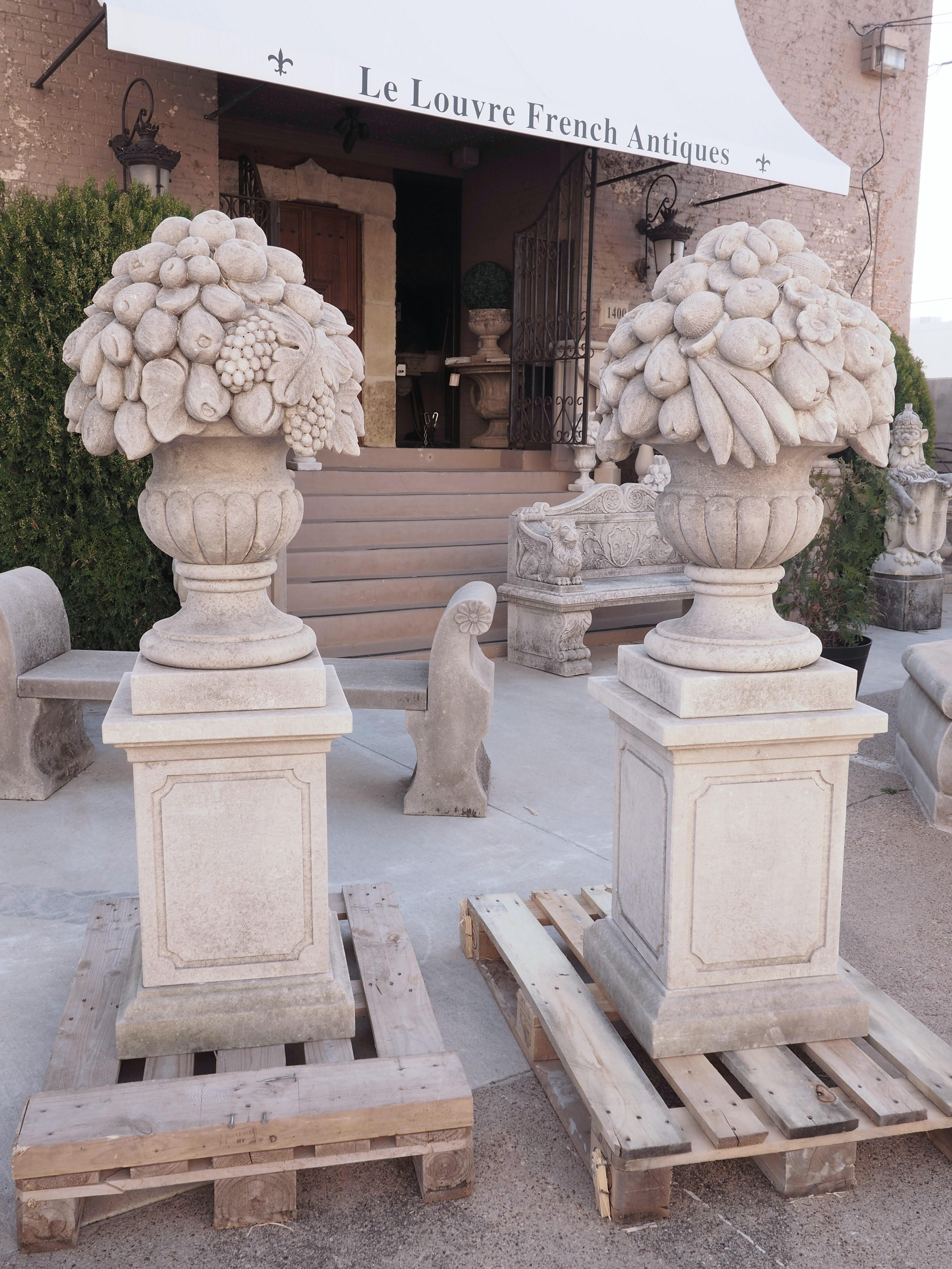 Pair of Italian Limestone Urns with Fruit and Floral Bouquets on Pedestals For Sale 12