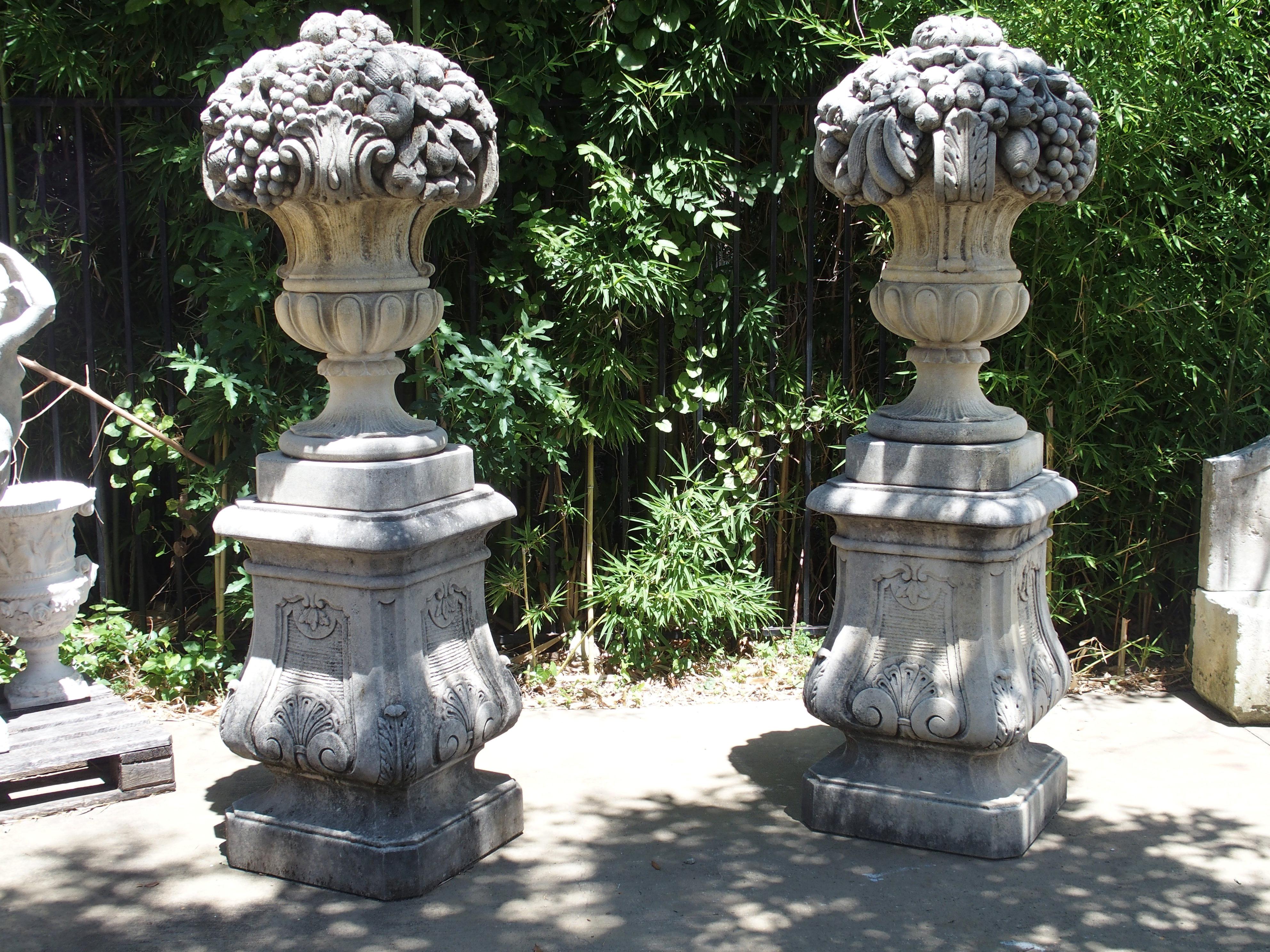 Pair of Italian Limestone Urns with Fruit and Floral Bouquets on Pedestals 15