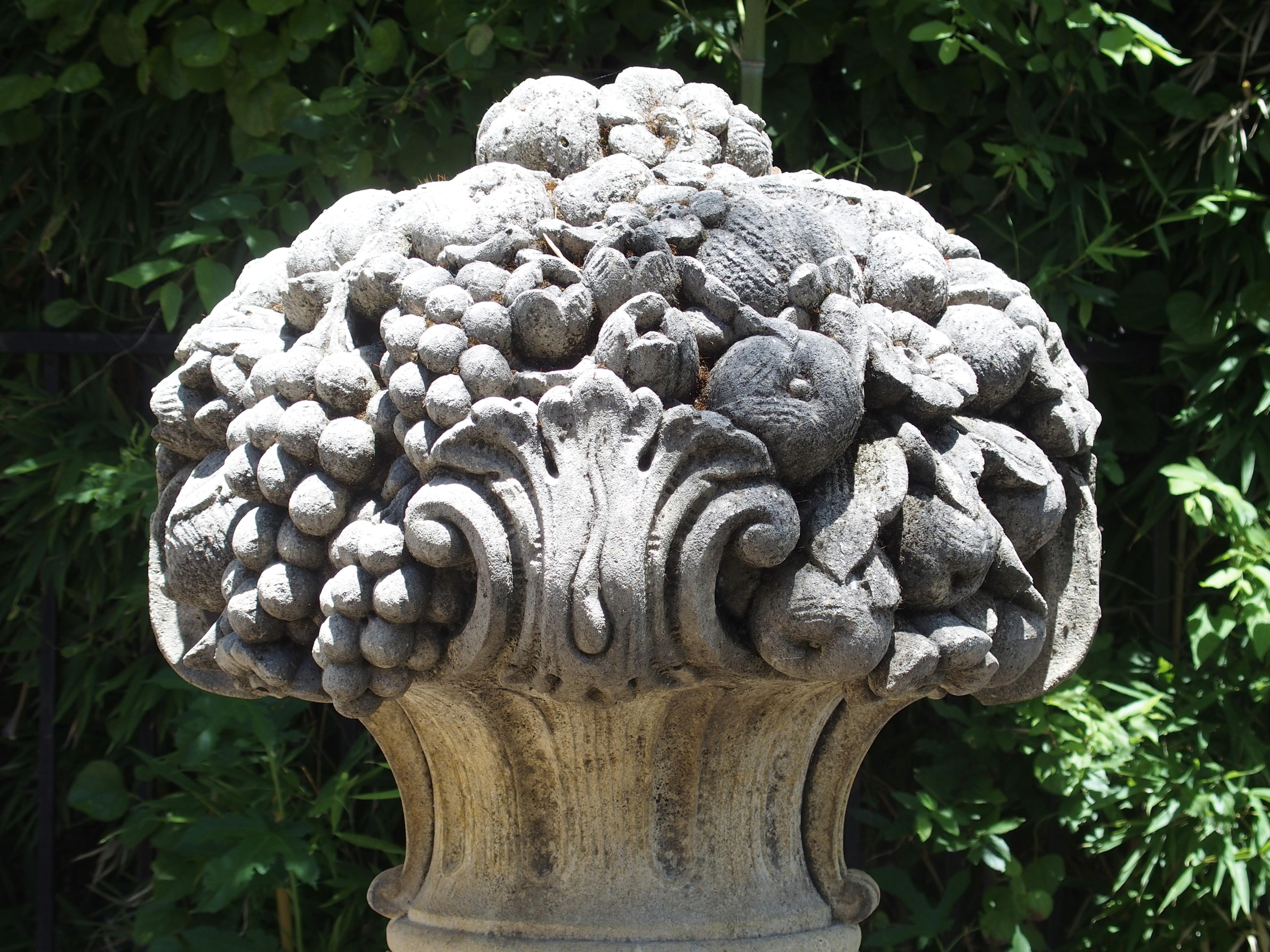 Pair of Italian Limestone Urns with Fruit and Floral Bouquets on Pedestals In Good Condition In Dallas, TX