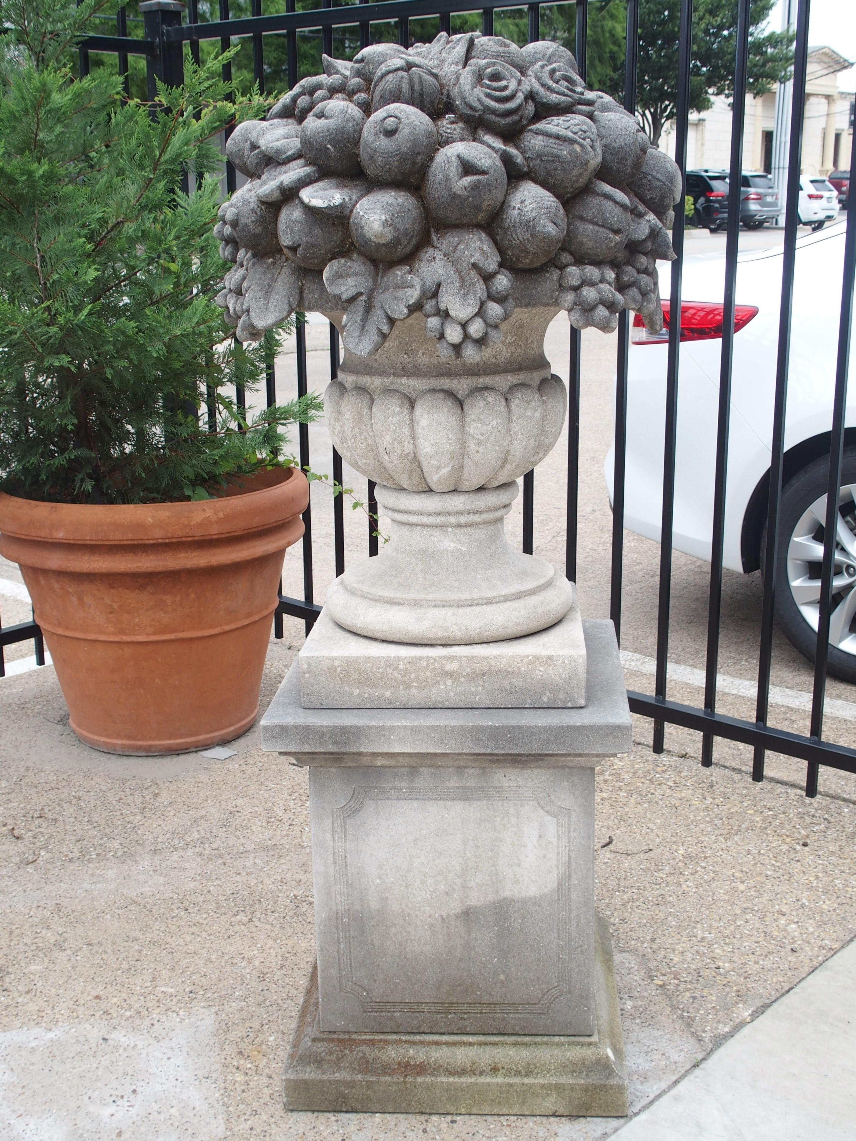 Pair of Italian Limestone Urns with Fruit and Floral Bouquets on Pedestals In Good Condition In Dallas, TX