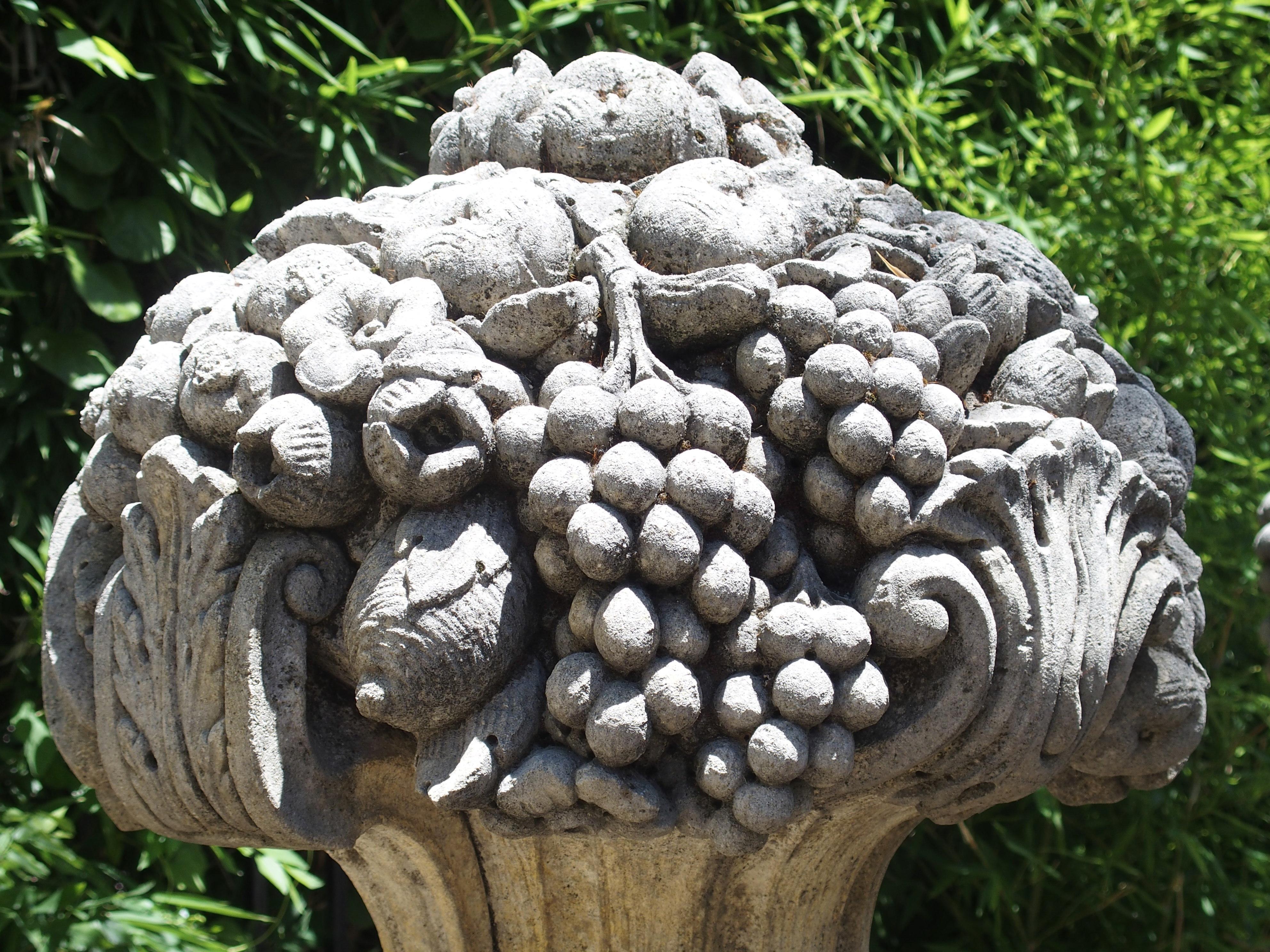 Pair of Italian Limestone Urns with Fruit and Floral Bouquets on Pedestals 3