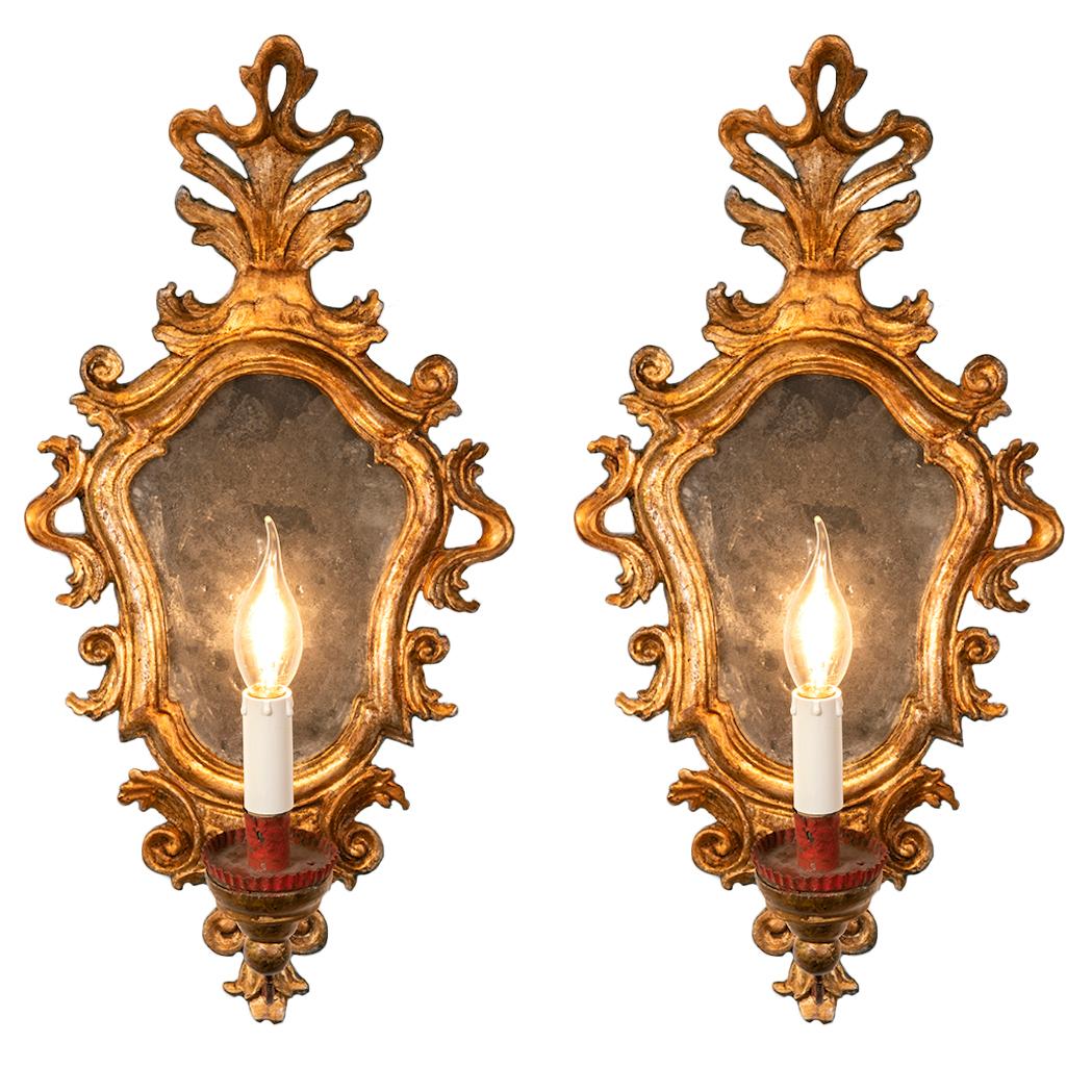 Pair of Italian Louis XV Mirrored Carved Giltwood Wall Sconces circa 1770
