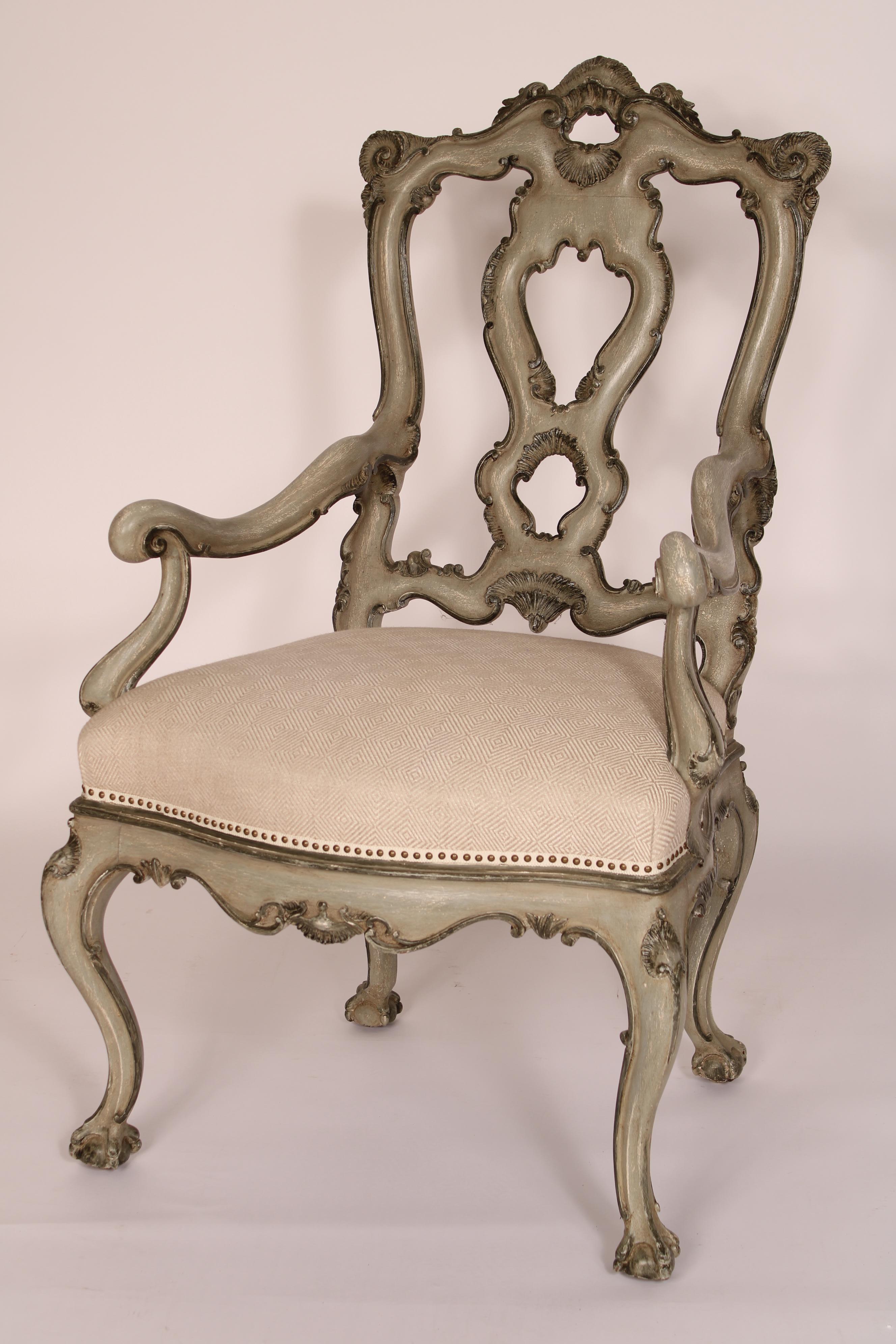 Pair of Italian Louis XV style grisaille painted armchairs, late 20th century. With cupids bow crest rails, pierced back splats, upholstered seats, cabriole legs ending in ball and claw feet. Grisaille paint showing white undercoat paint throughout.