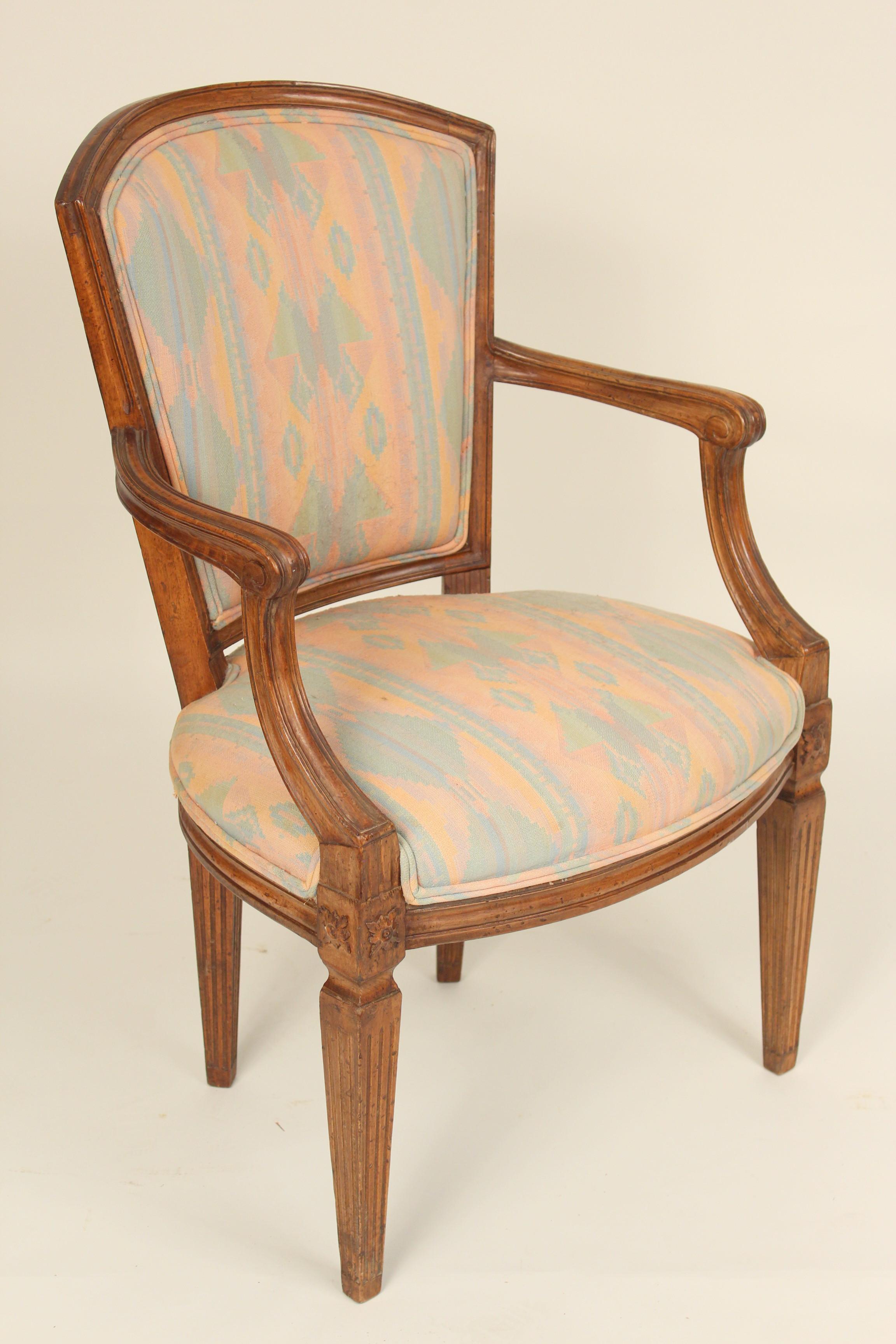 Pair of Italian Louis XVI style beechwood and walnut armchairs, circa 1970s. Nice finish and upholstery.