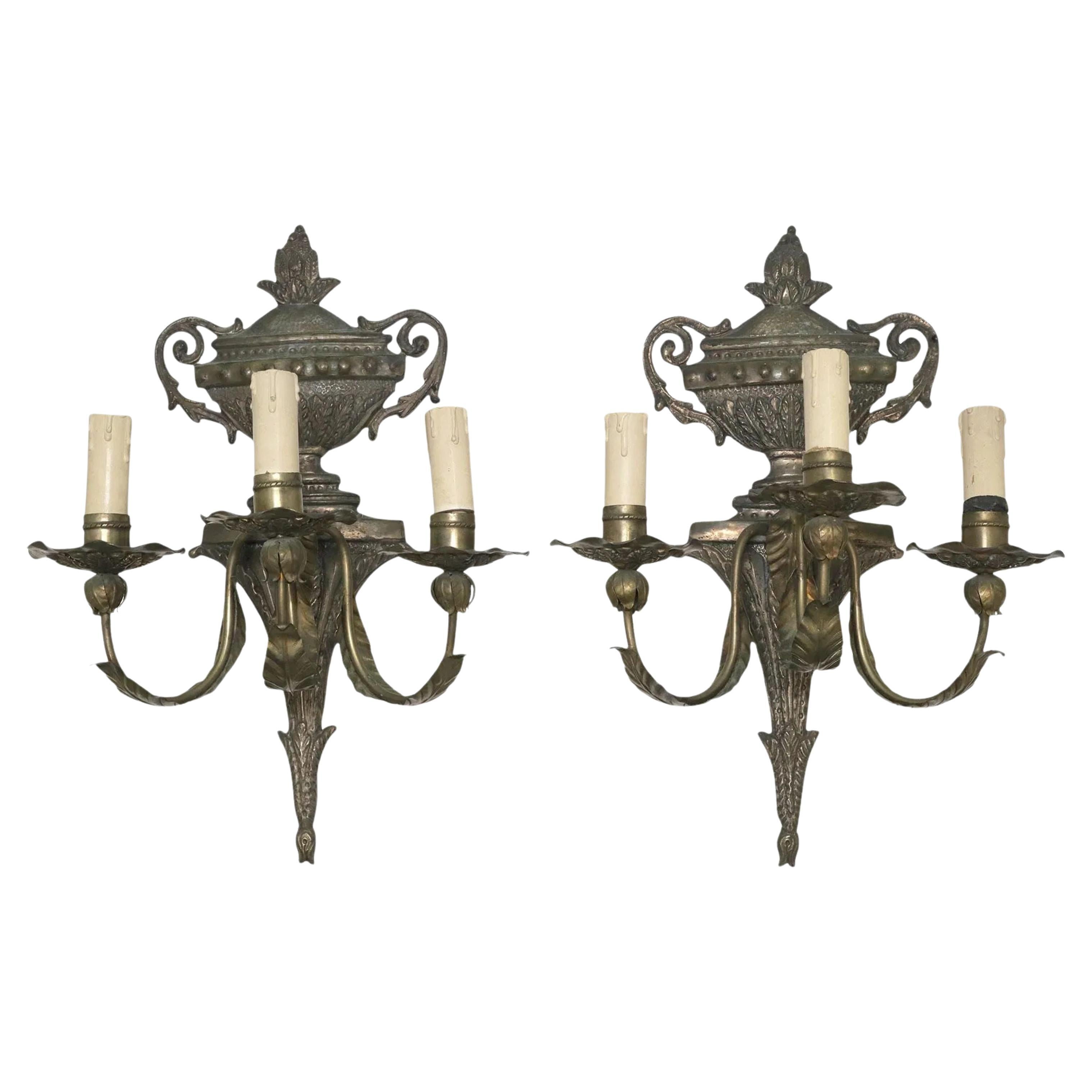 Pair of Italian Louis XVI Style Three-Light Patinated Metal Wall Sconces For Sale