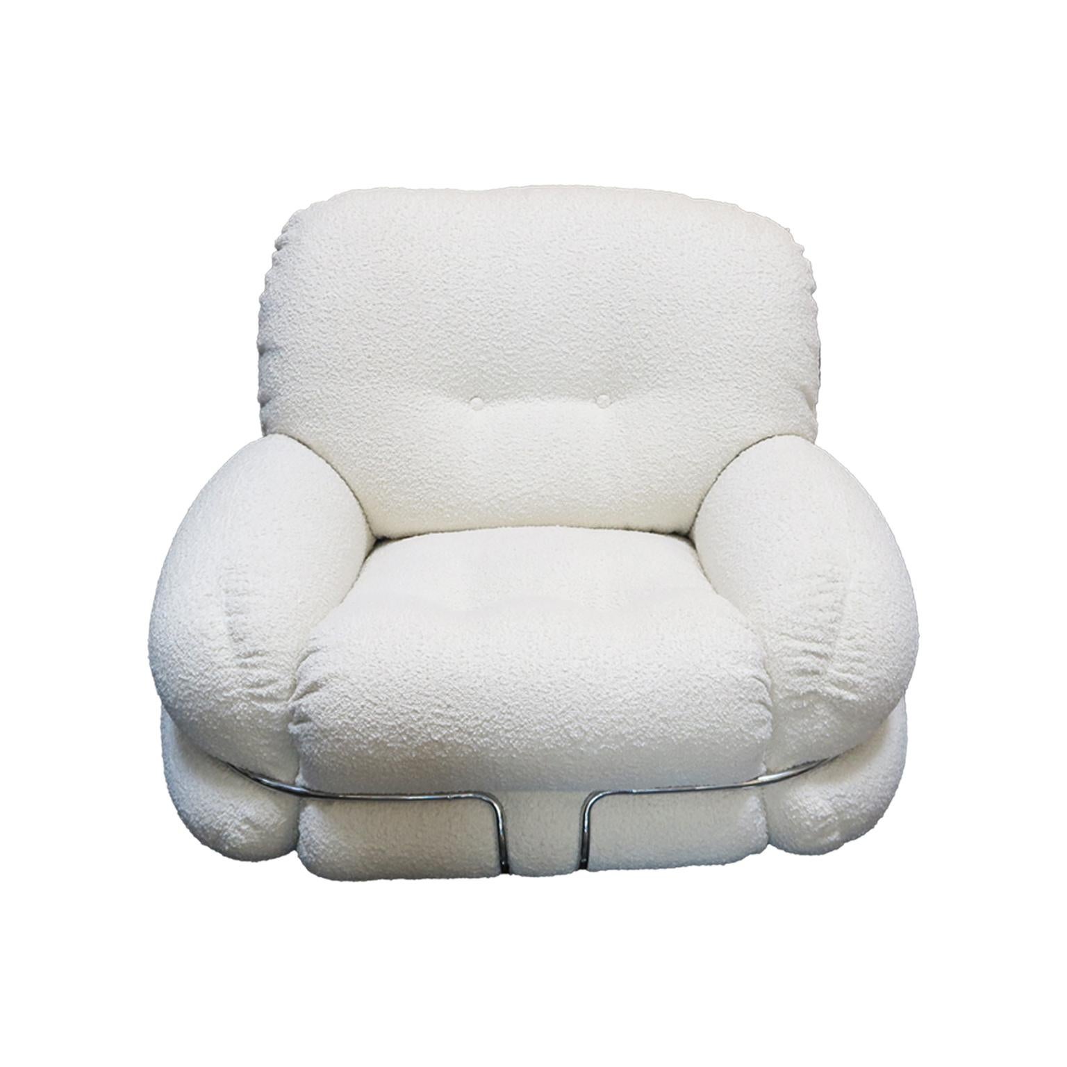 This pair of Italian Mid-Century Lounge chairs attr. to Adriano Piazzesi is newly upholstered with white bouclé fabric that features a tufted detail on the seat and back.  These chairs showcase comfortable upholstered arms, that are accented with a