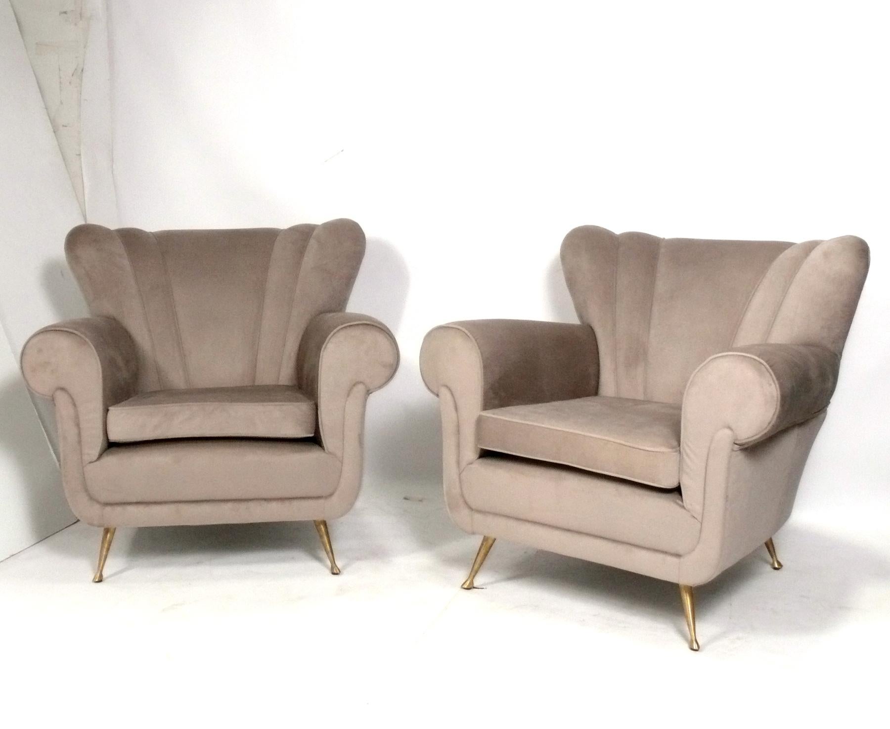 Pair of Curvaceous Italian Mid Century Style Lounge Chairs, in the style of Paolo Buffa, Italy, circa 2000s. Based on a 1950s design, these were produced in the 2000s. They look great from every angle. 
