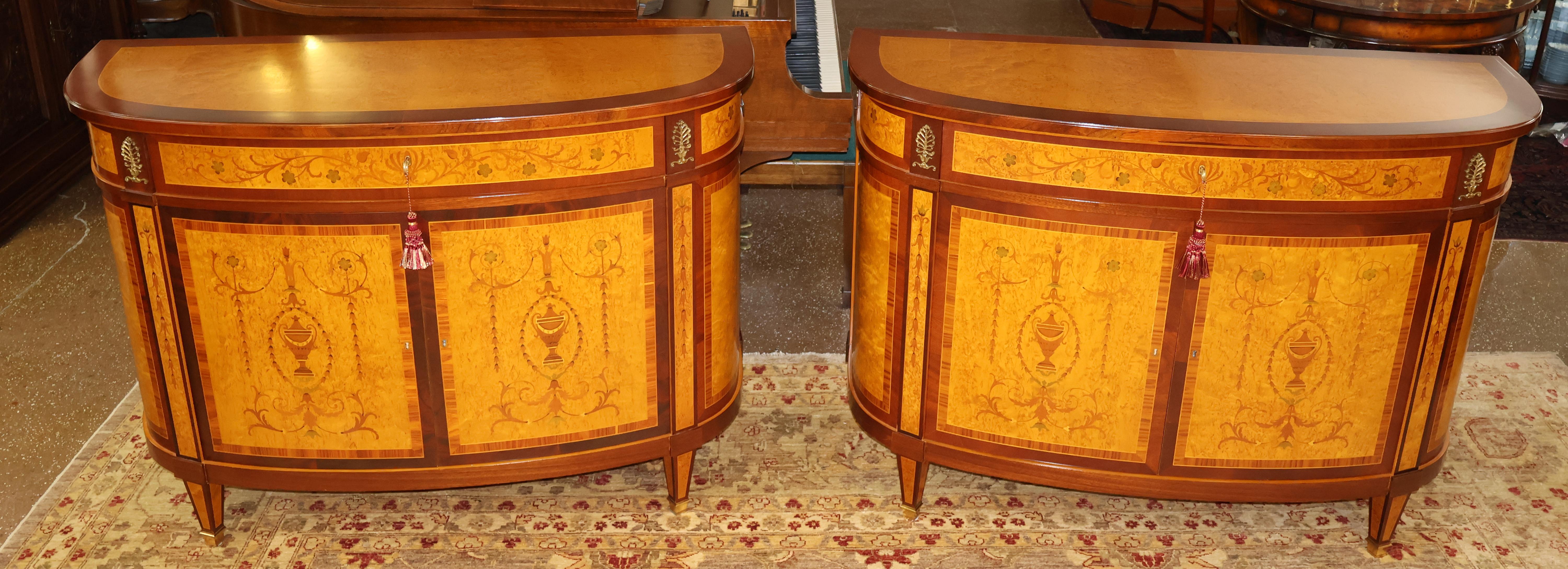 ​Pair Of Italian Made Burled Walnut Banded Demilune Chest Server Buffets

Dimensions : 54