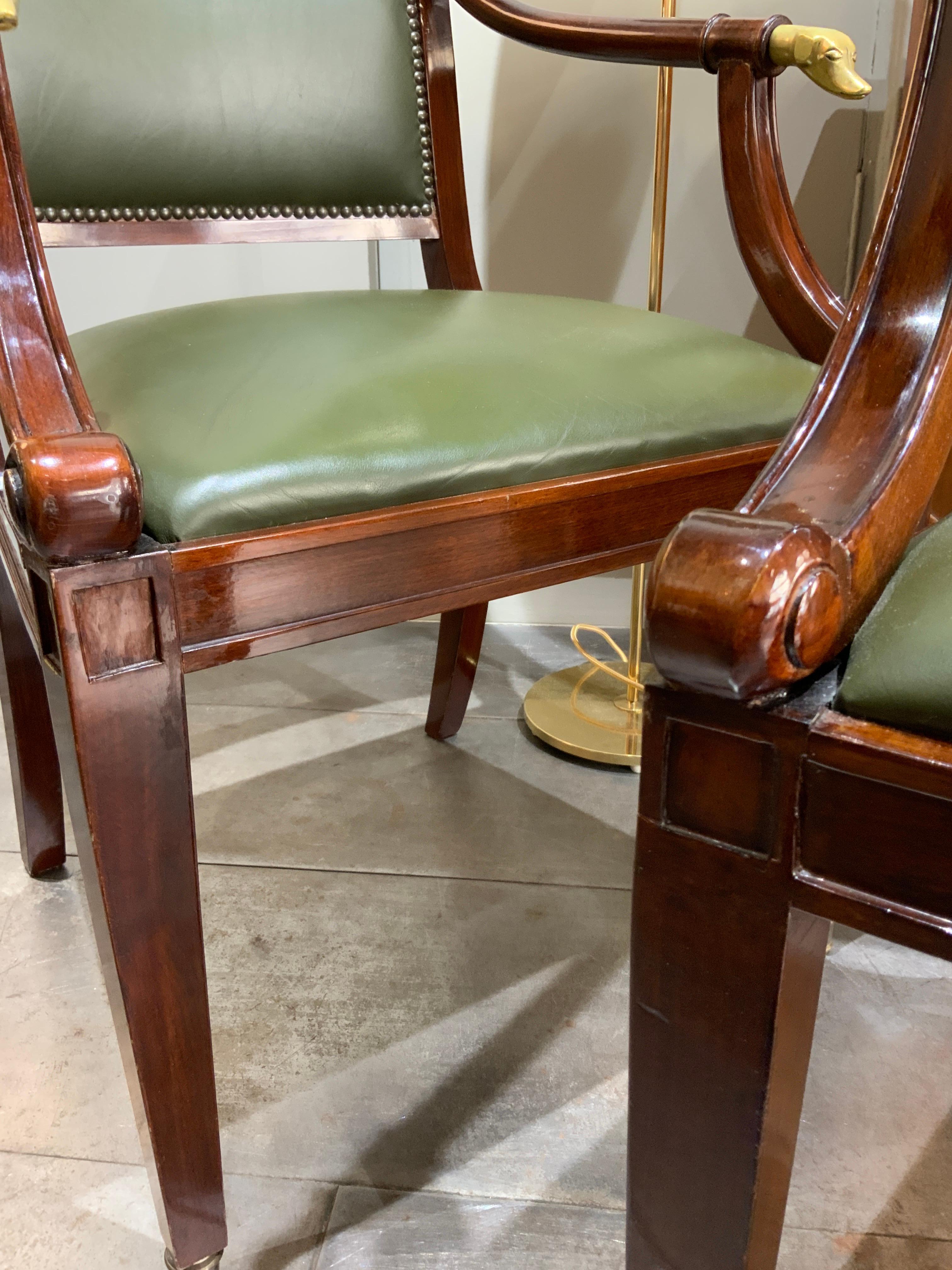 Mid-Century Modern Pair of Italian Mahogany Armchairs with Brass Dogs Heads circa 1960 For Sale