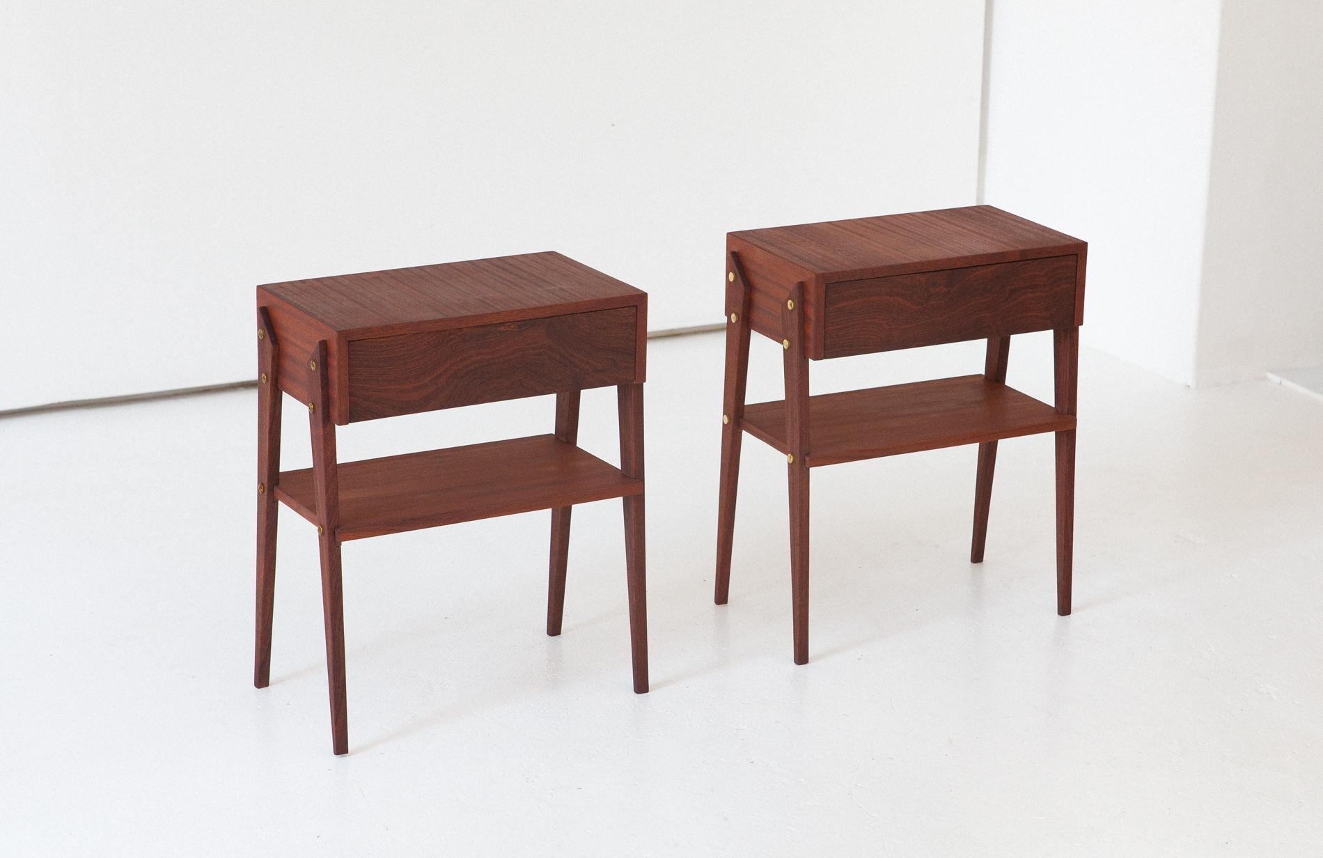 Set of two nightstands, manufactured in Italy in 1950s 
These two side tables has made of  mahogany wood with brass details
Airy and modern design
This is a Mid-Century Modern style items.

Completely restored, sanded and oil finished


 