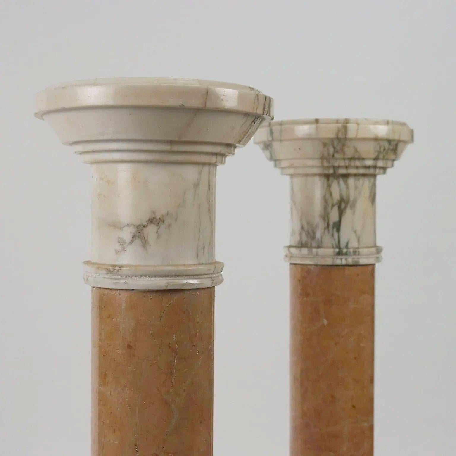 Each cylindrical shaft with molded top raised on circular base 