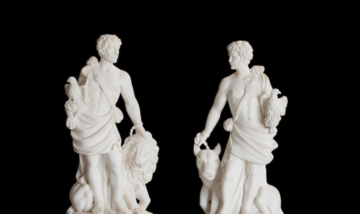 Carved Pair of Italian Marble Statues of Hunters