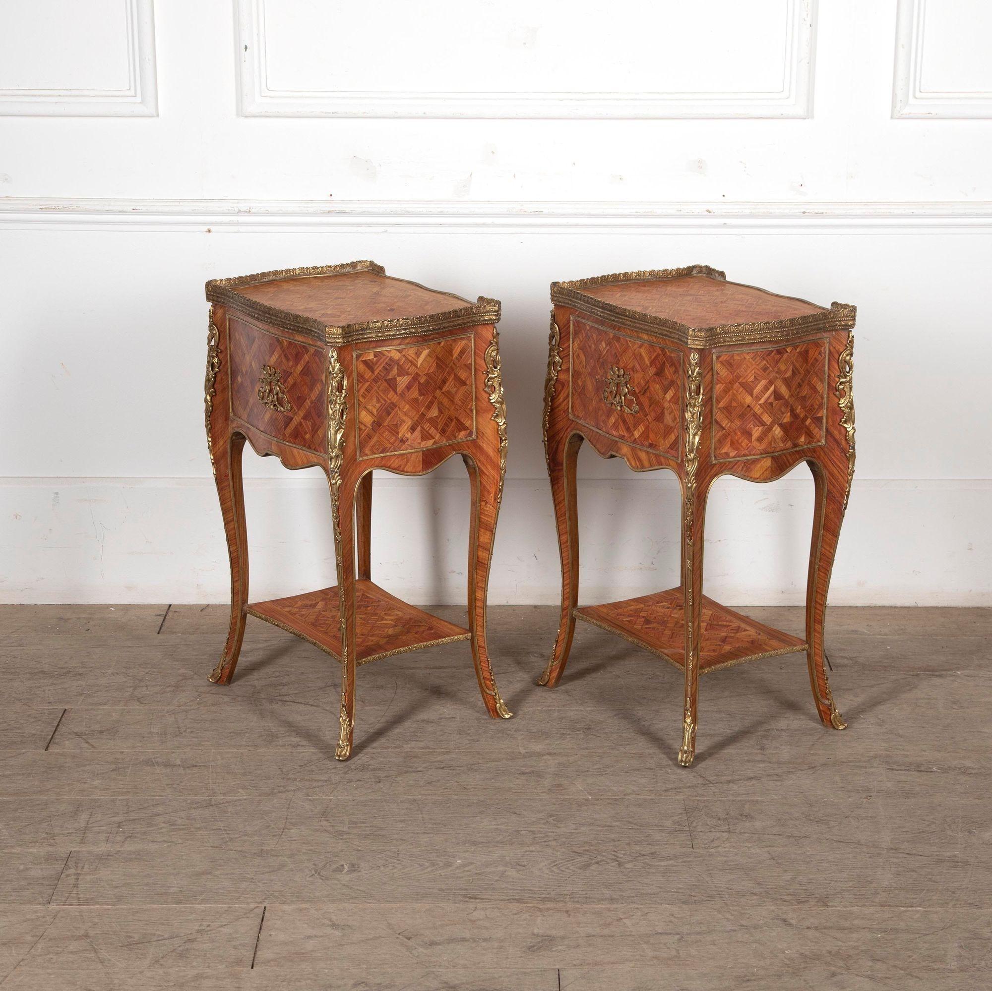 Fabulous pair of 20th century Italian marquetry and ormolu bedside tables.
Both are composed of bleached kingwood with a brass gallery and lots of ormolu mounts including to the shaped backs.
Circa 1920.