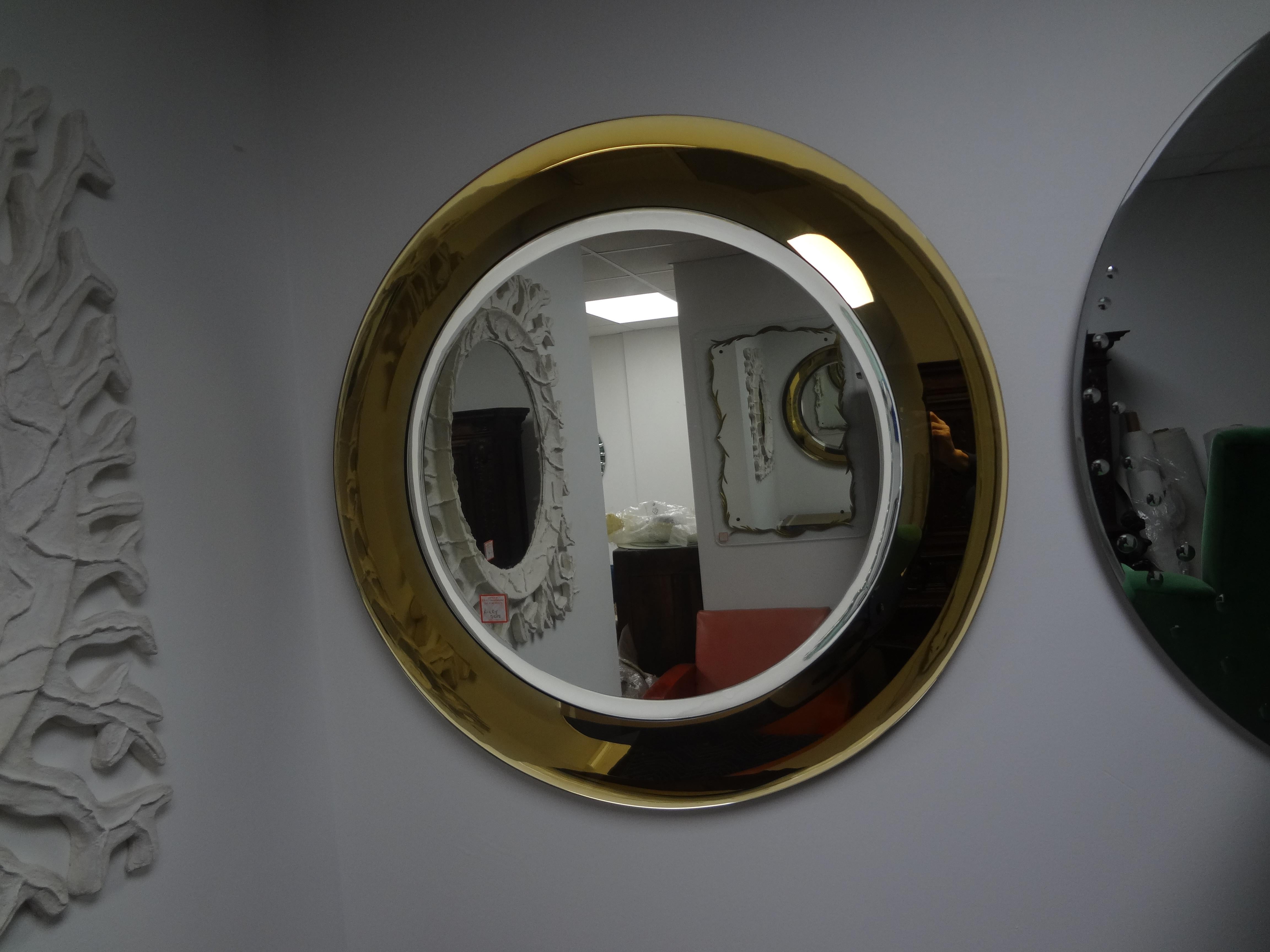 Pair Of Italian Fontana Arte Attributed Beveled Mirrors.
Hard to find pair of gold Italian  Max Ingrand for Fontana Arte attributed mirrors with three exterior gold beveled bands surrounding a beveled silver central mirror.
These outstanding Italian