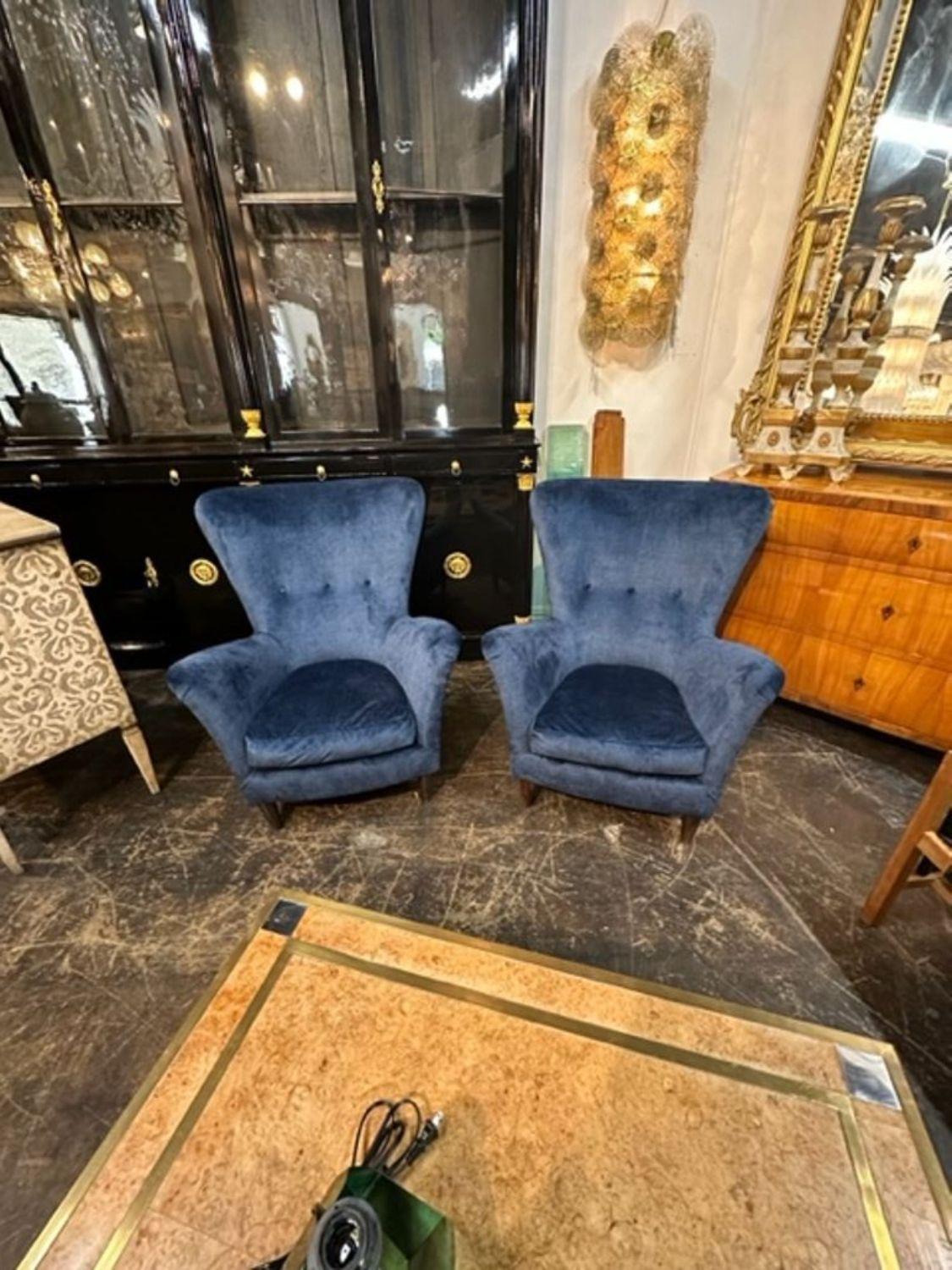 Great pair of Italian MCM navy velvet upholstered club chairs. Circa 1960. Perfect for today's eclectic design!