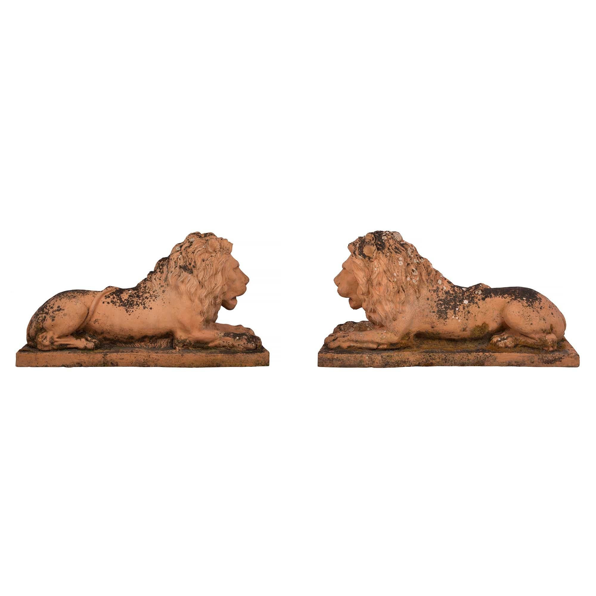 Pair of Italian Mid 19th Century Terra Cotta Lions For Sale