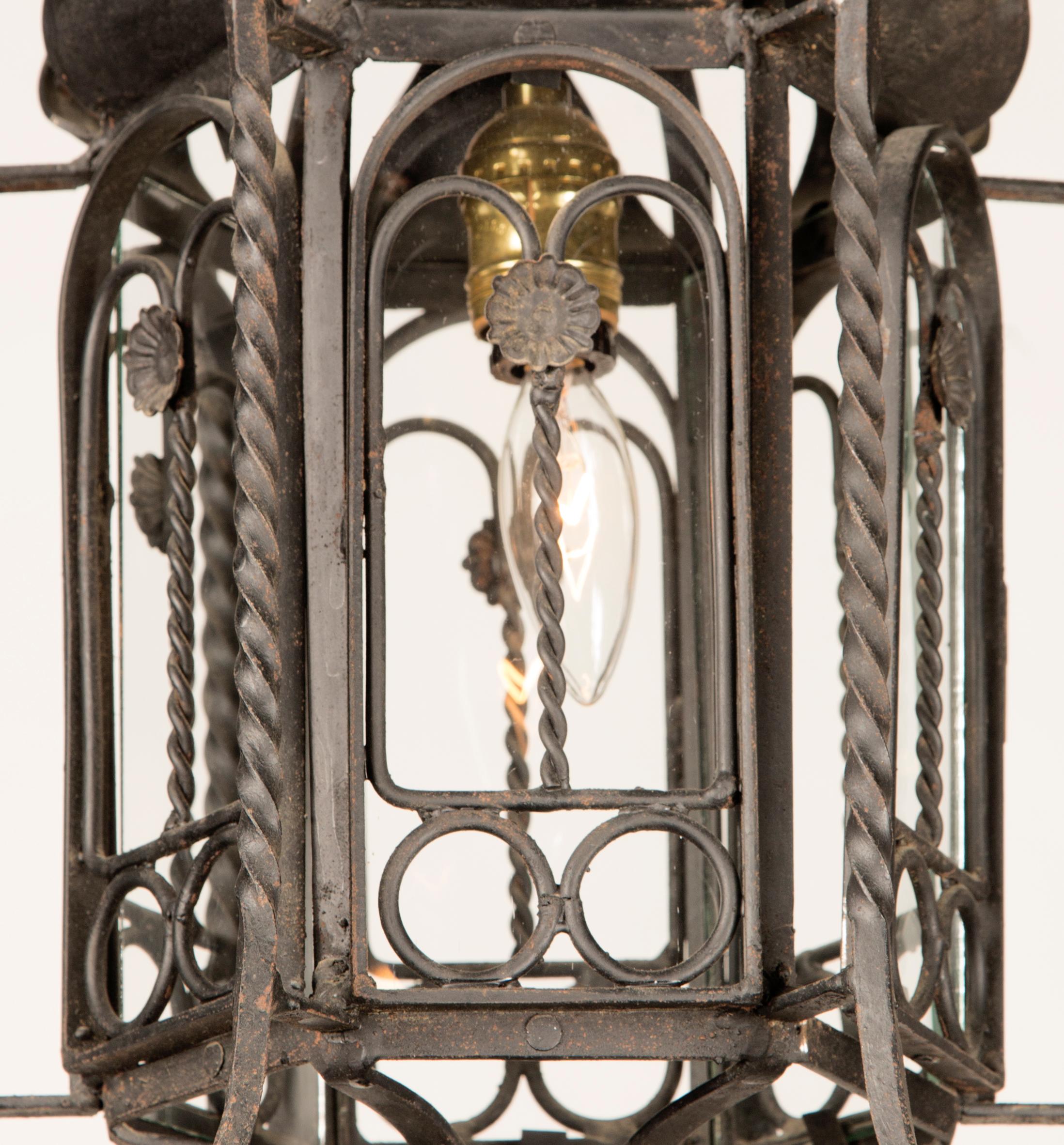 Pair of Italian Mid 20th Century Wrought Iron Hanging Lanterns In Good Condition For Sale In New Orleans, LA
