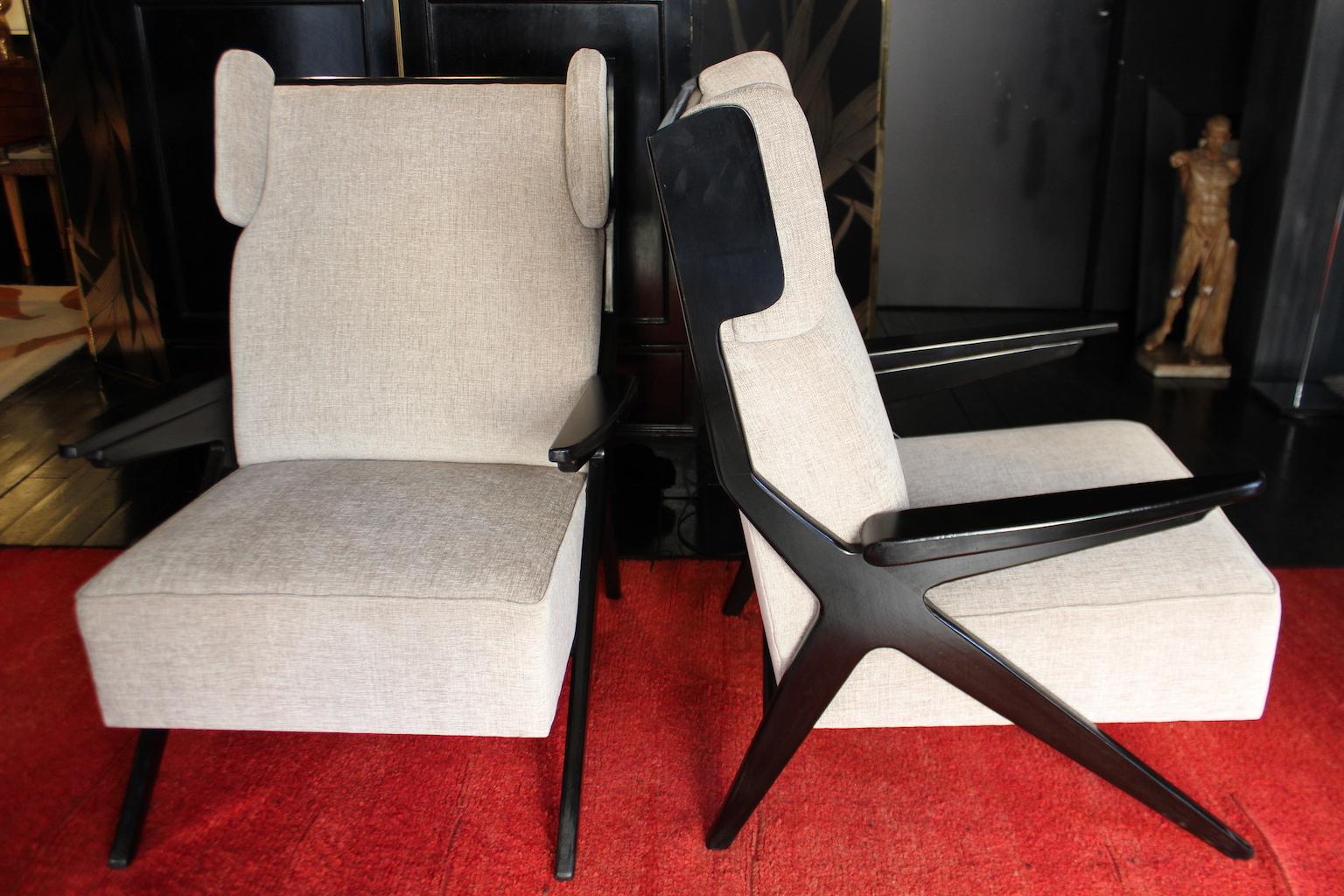 Completely restored pair of Italian midcentury armchairs( 1950) in solid oak and ivory chenille velvet, internal padding in hypoallergenic material.