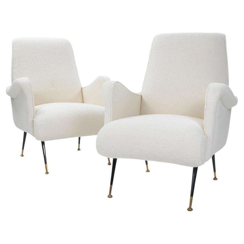 Pair of Italian Mid-Century Armchairs off-white Bouclé Fabric by G. Radice 1950s

The armchairs have a narrow cut, the seat is pulled slightly forwards and therefore emphasised. 
The backrest is high, making the armchair very comfortable 
All the