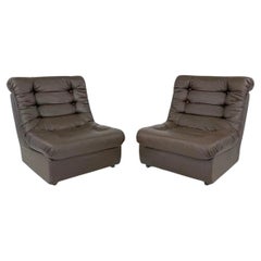 Pair of Italian mid century brown tufted lounge chairs