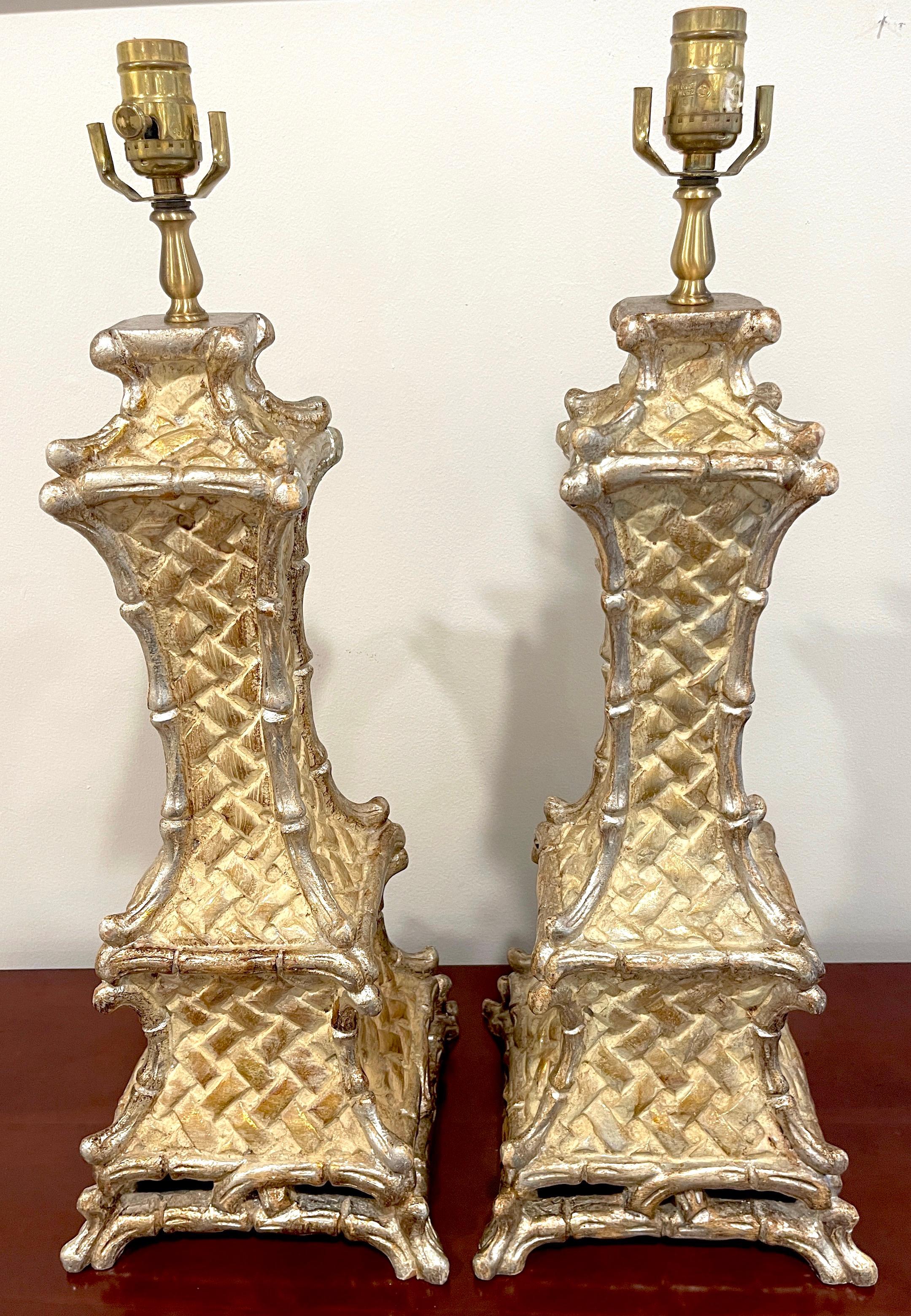 Pair of Italian Mid-Century Carved Giltwood Faux Bamboo Column lamps
Italy, circa 1960s

A very sheik pair of carved giltwood with silver leaf trim faux bamboo pagoda column lamps. 

Ready to shade and place, New wiring. 

Overall