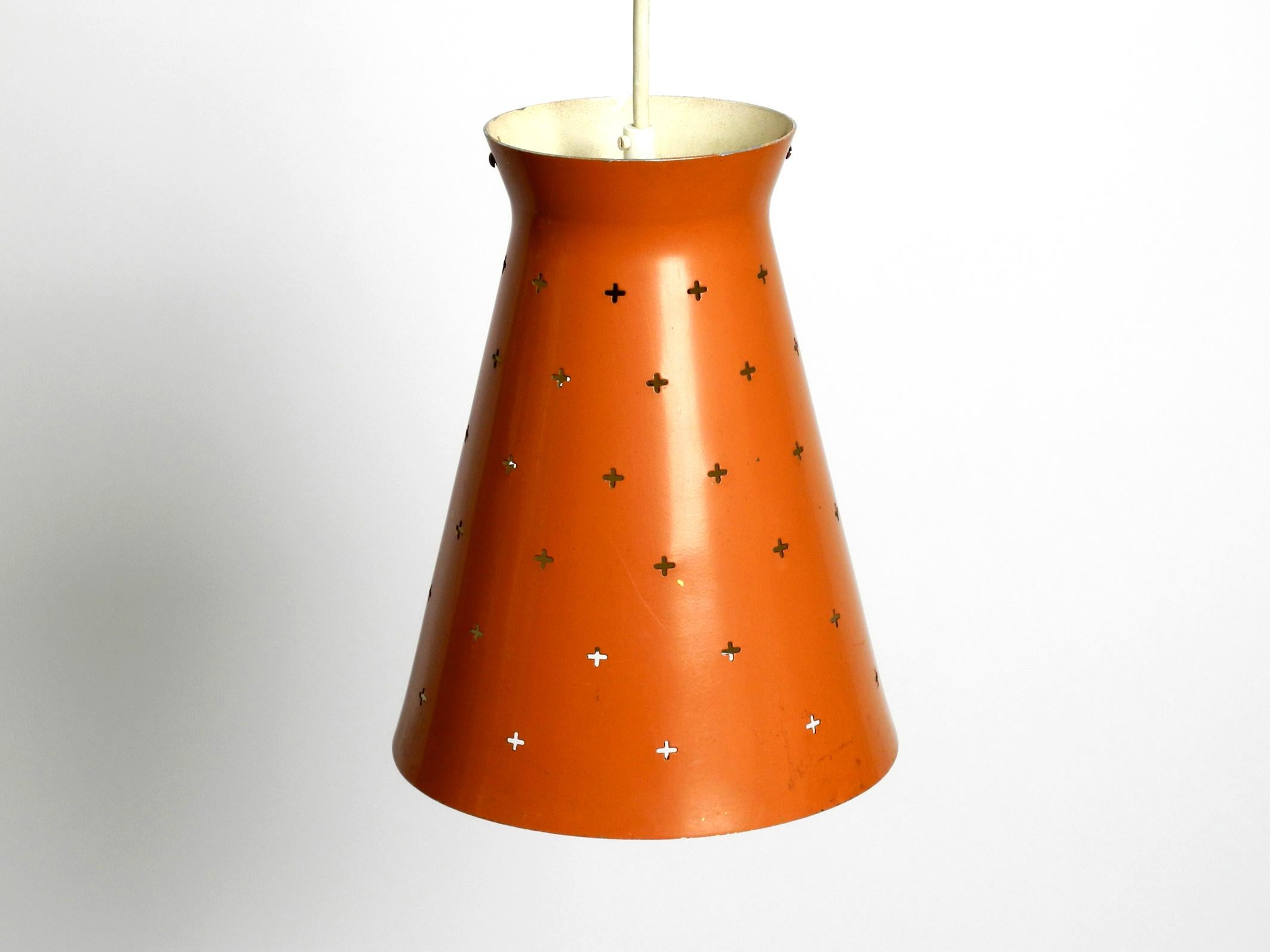 Pair of Italian Mid Century Diabolo design perforated sheet metal pendant lamps For Sale 7