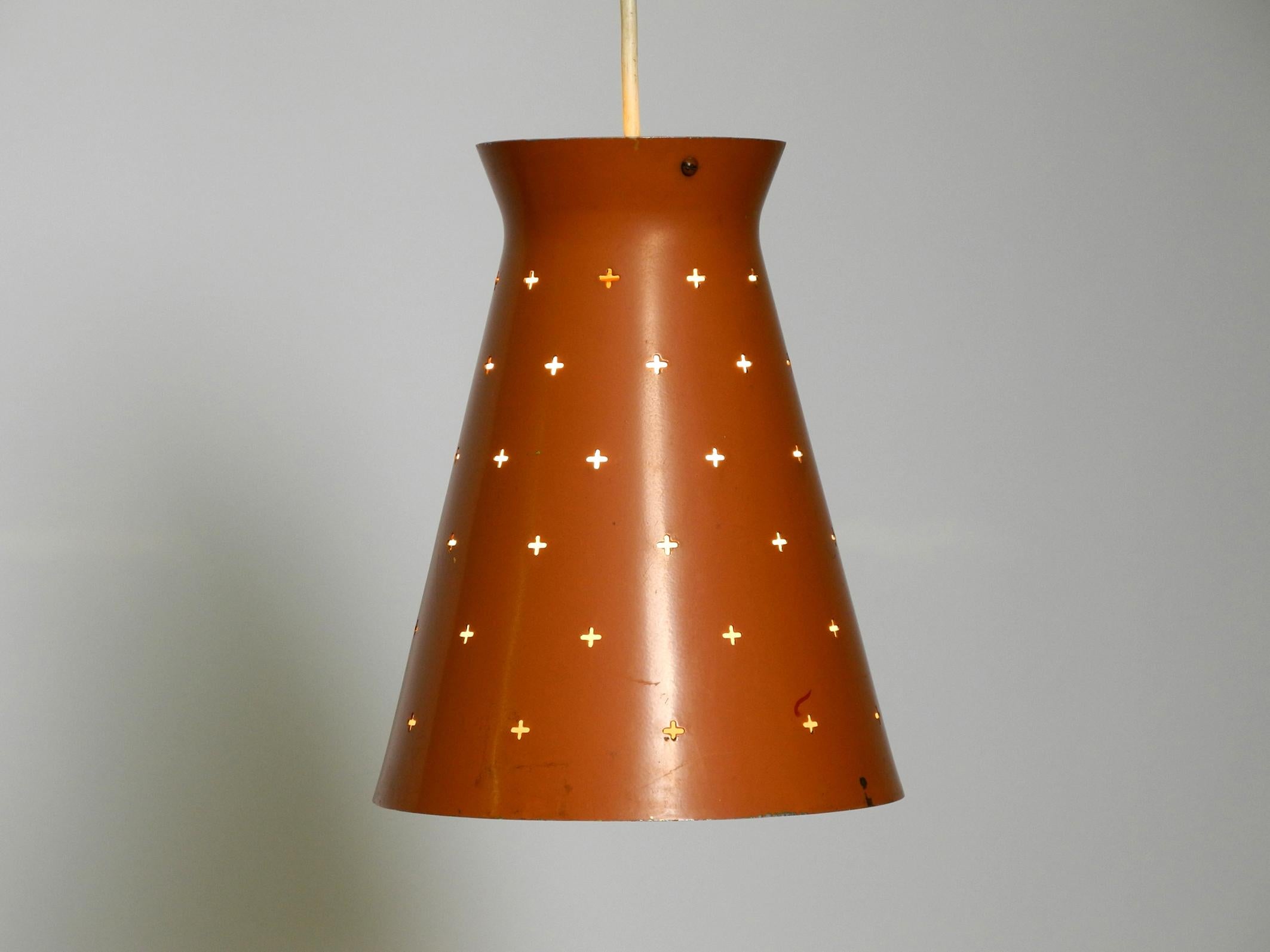 Pair of Italian Mid Century Diabolo design perforated sheet metal pendant lamps For Sale 9