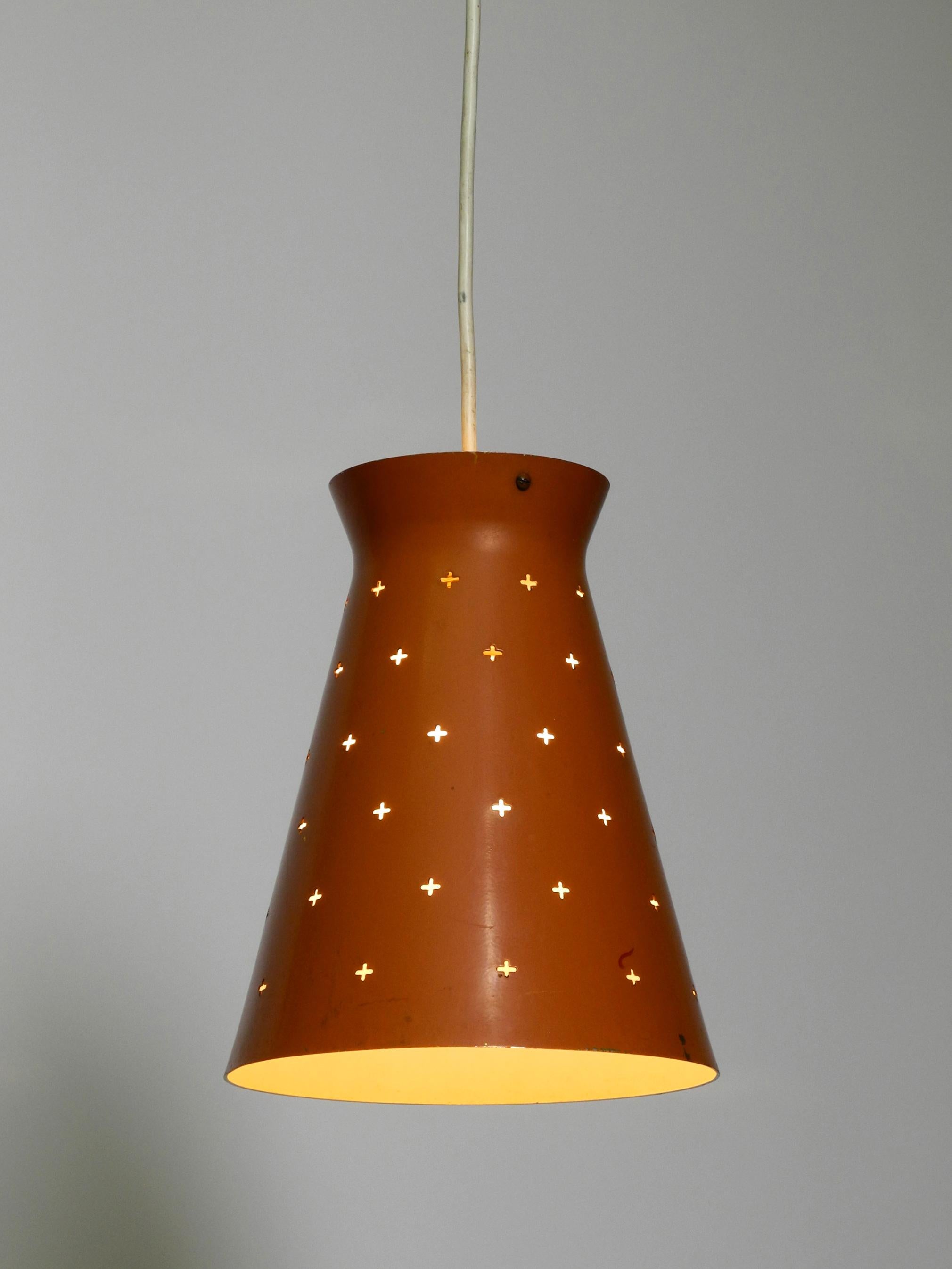 Pair of Italian Mid Century Diabolo design perforated sheet metal pendant lamps For Sale 10