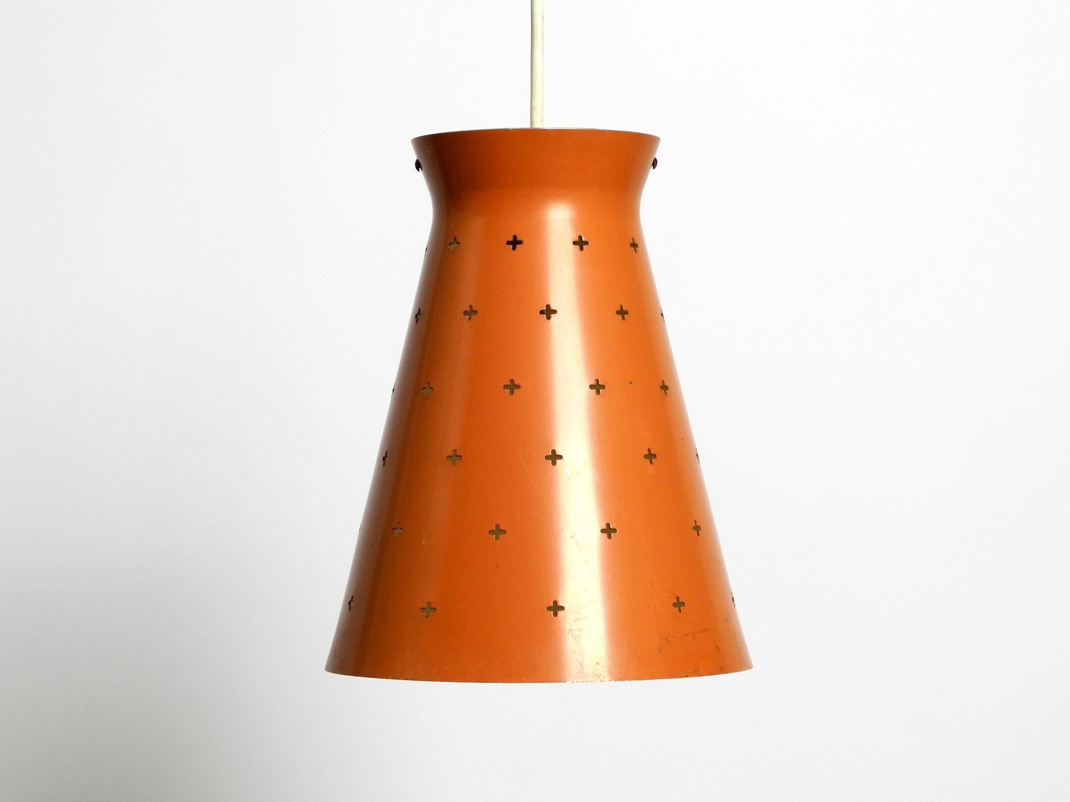 Pair of Italian Mid Century Diabolo design perforated sheet metal pendant lamps For Sale 2