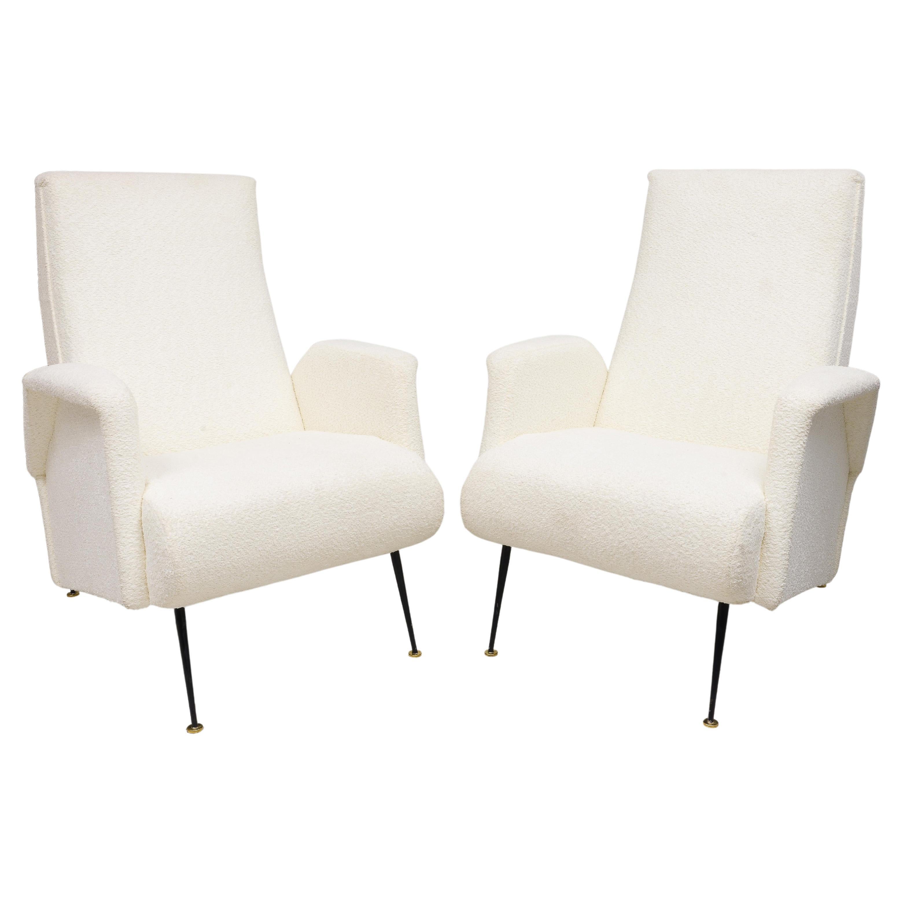 Pair of finely crafted and recently upholstered vintage Italian lounge chairs -sculptural design - extremely comfortable.