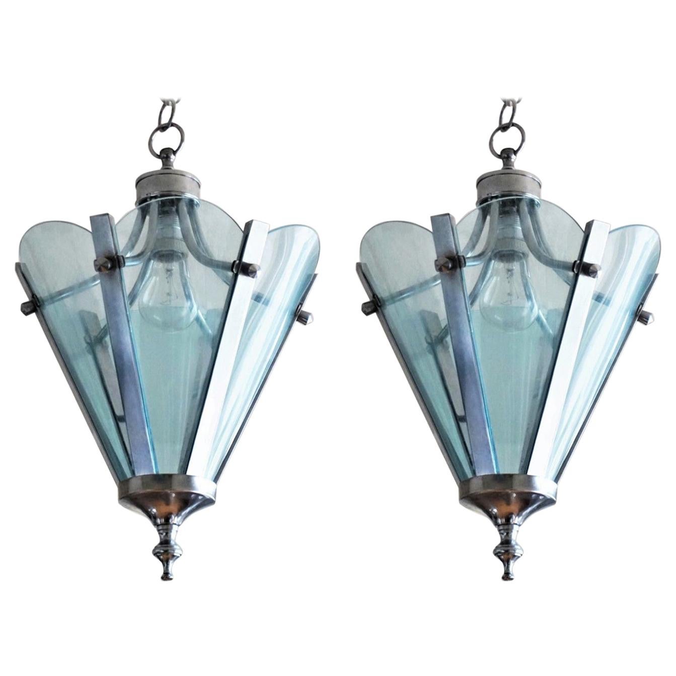 Pair of Mid-Century Modern lanterns, Italy, circa 1960-1969. Hexagonal structure in chromed metal frame with six azure blue transparent acrylic panels. Each lantern with one brass and ceramic E27 socket, rewired. 
In good original condition, some