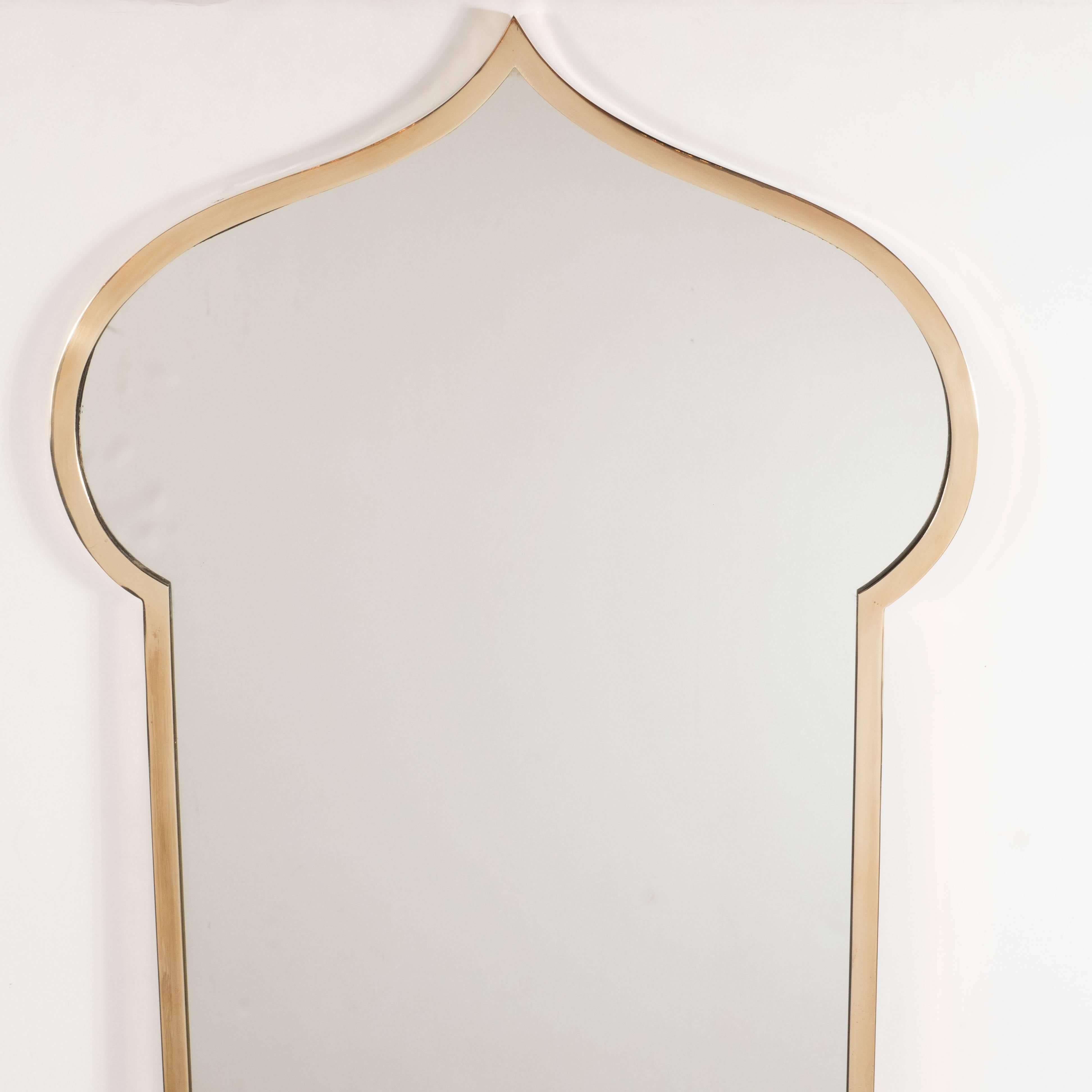 This handsome and refined pair of Mid-Century Modern mirrors were realized in Italy, circa 1960. They feature rectangular bodies that dramatically expand outwards near their apex creating rounded sides and then receding to point. This bell-shaped