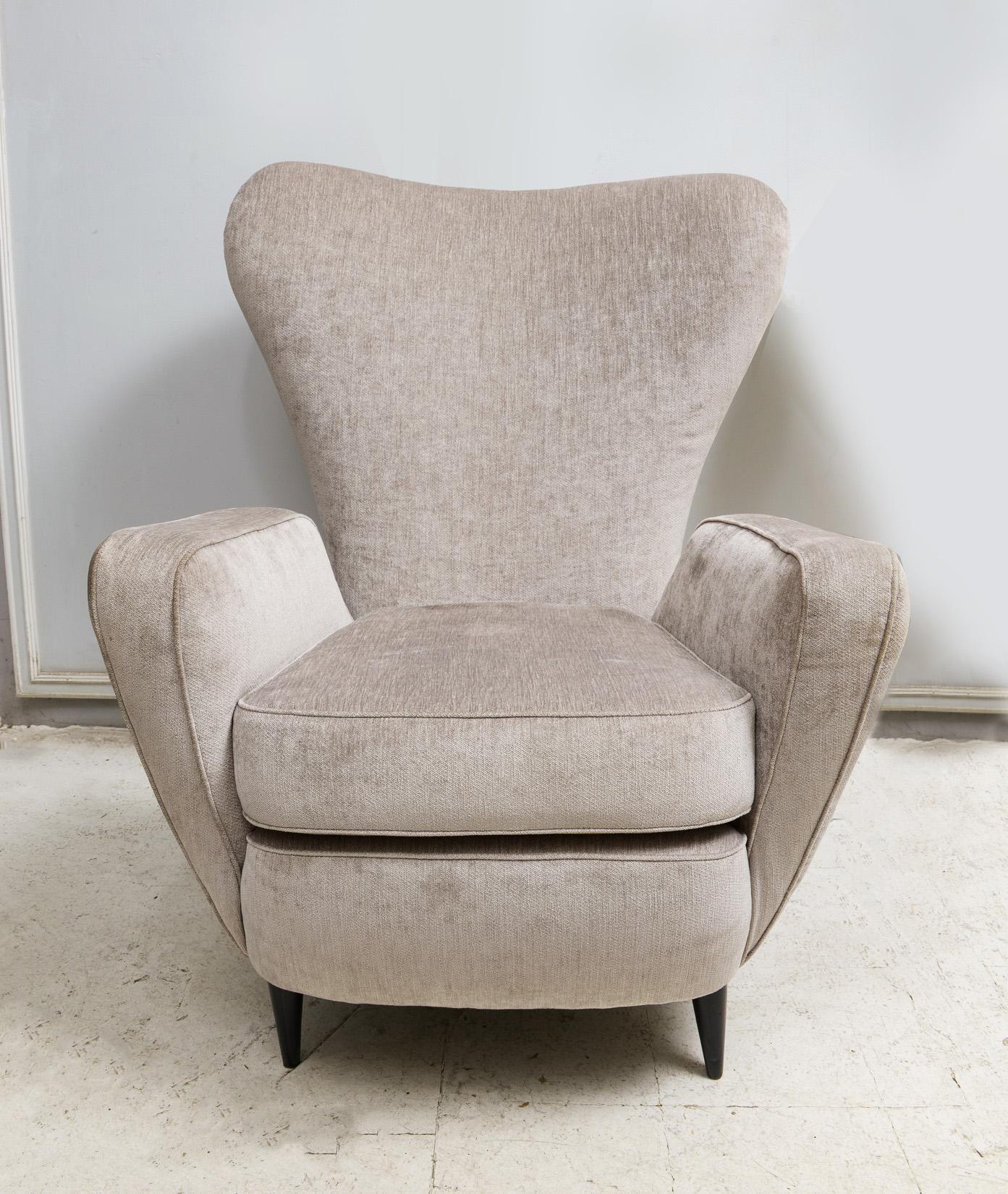 Pair of Italian Mid-Century Modern Chairs Upholstered in Donghia Fabric.
The overall Width of 29.25