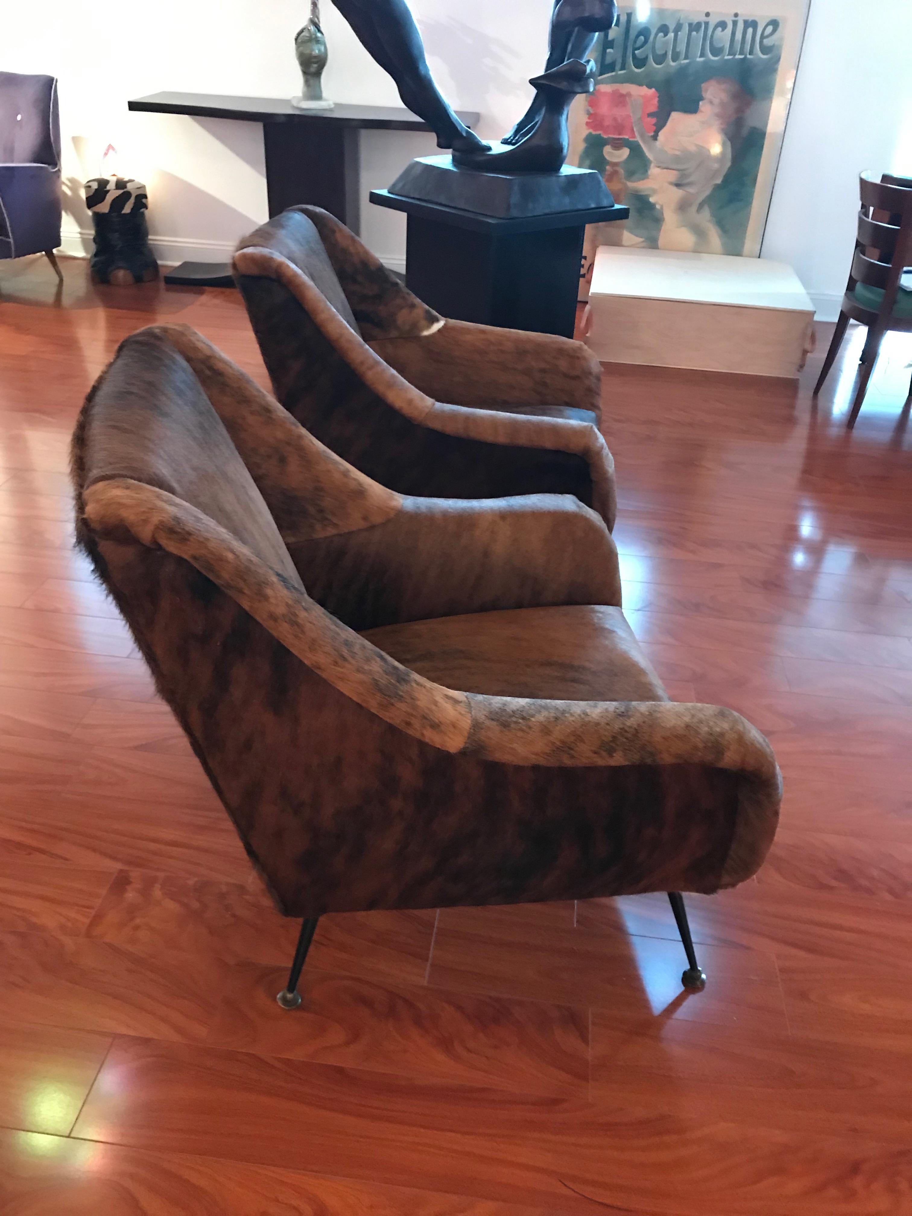 Mid-20th Century Pair of Italian Mid-Century Modern Club Chairs Covered in Cowhide For Sale