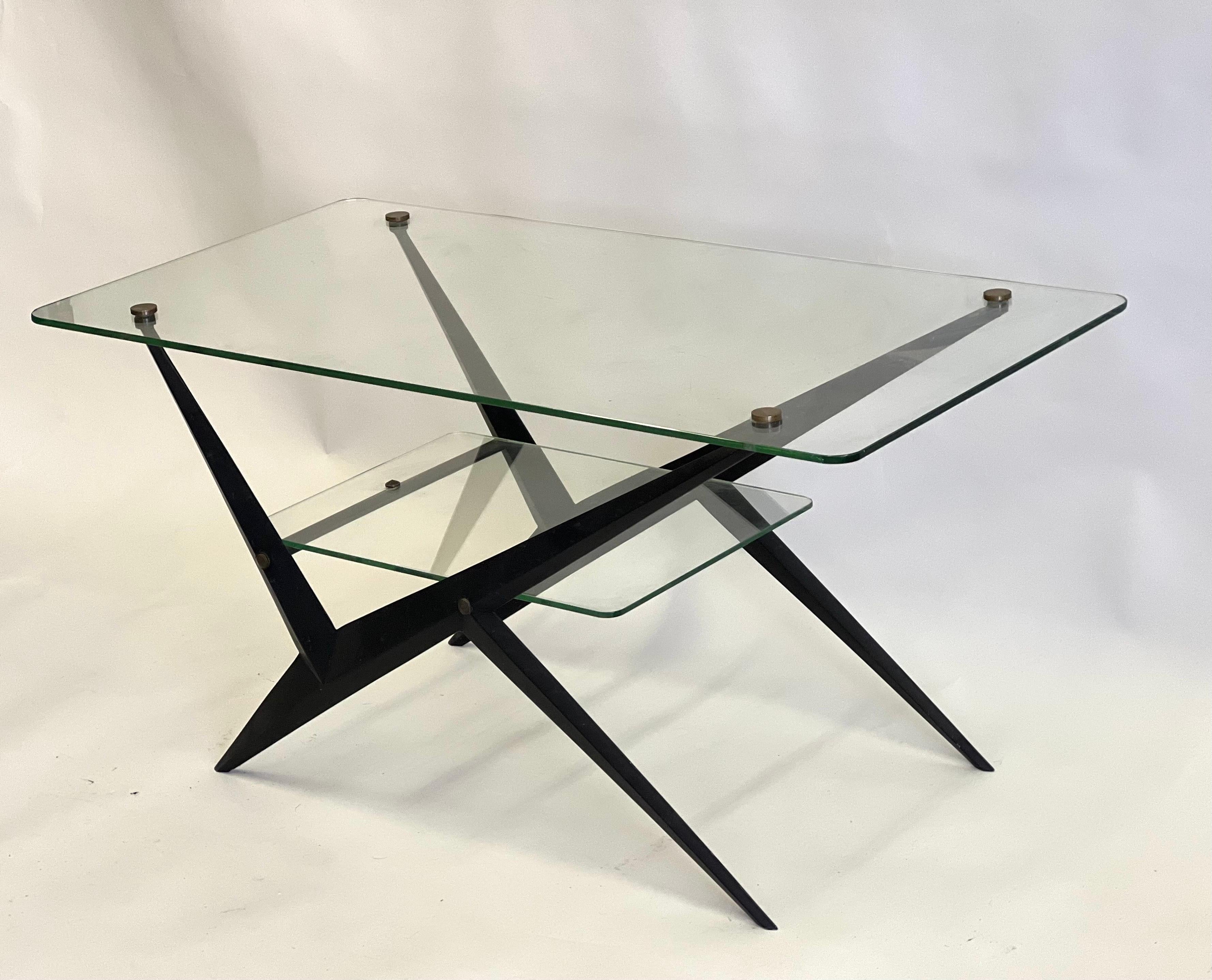 Elegant and Stylish Italian Mid-century Modern Side or End Tables in the style of Giacomo Balla and Ico Parisi and designed by Angelo Ostuni. Each table has a daring architectural structure that is angled and conveys speed and movement typical of