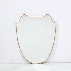Pair of Italian Mid-Century Modern Curvilinear Shield Brass Framed Mirrors