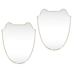 Pair of Italian Mid-Century Modern Curvilinear Shield Brass Framed Mirrors