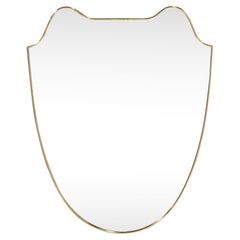 Pair of Italian Mid-Century Modern Curvilinear Shield Brass Framed Mirrors
