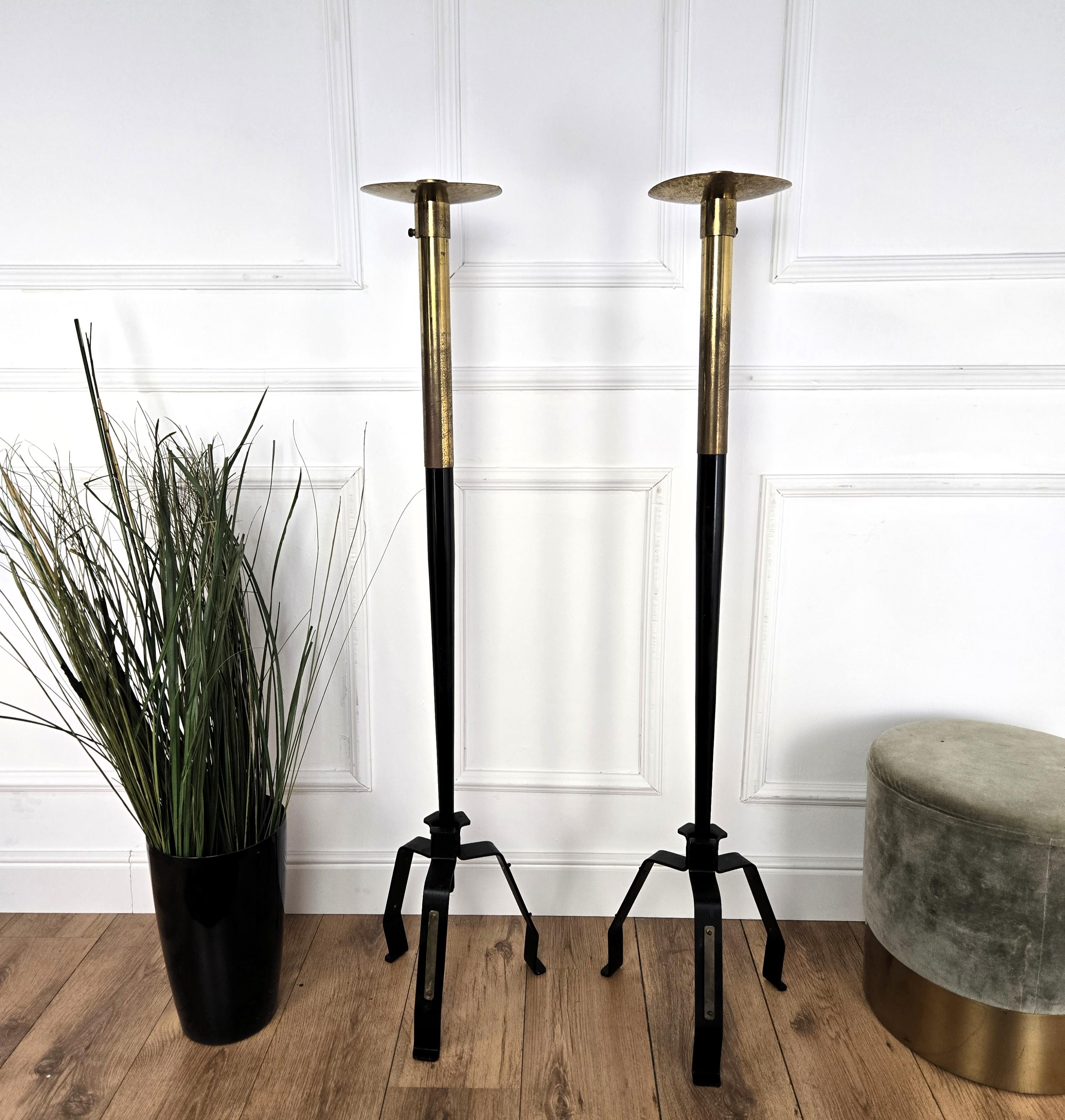 Pair of tall floor candle holders