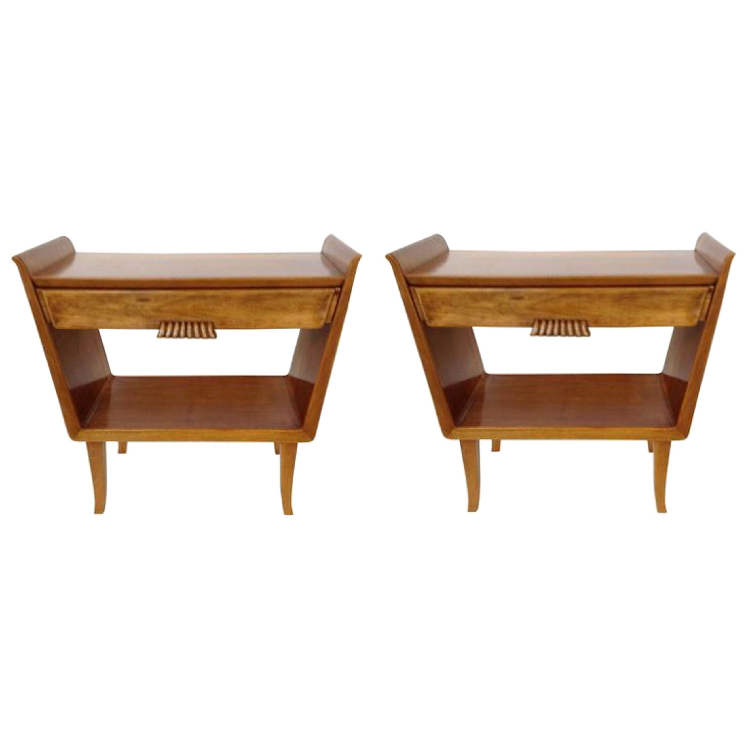 Pair of Italian clear fruitwood Vintage nightstands, with 1 drawer each.
Stylish and elegant Italian Mid-Century Modern bedside cabinets.