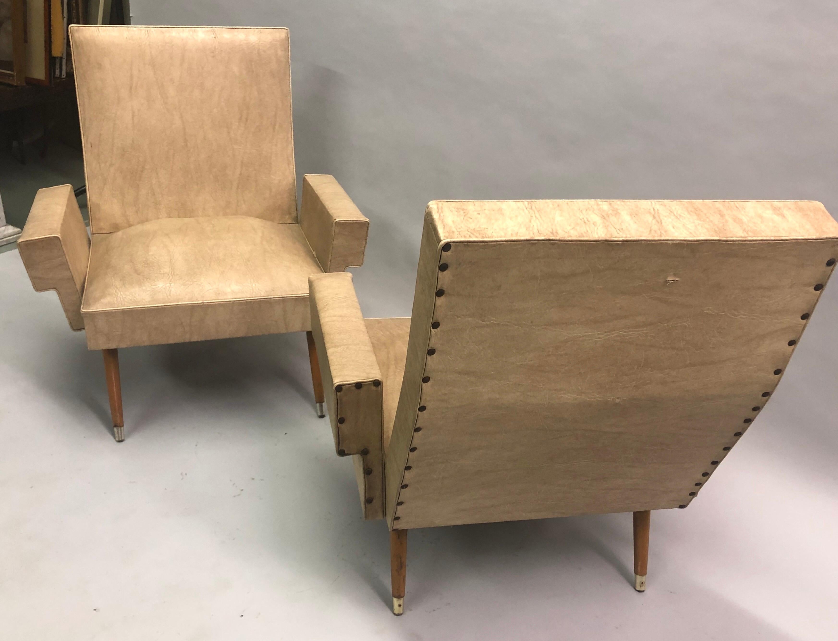 Pair of Rare Italian Futurist Lounge Chairs with a stunning and unique form conveying speed and movement and 
