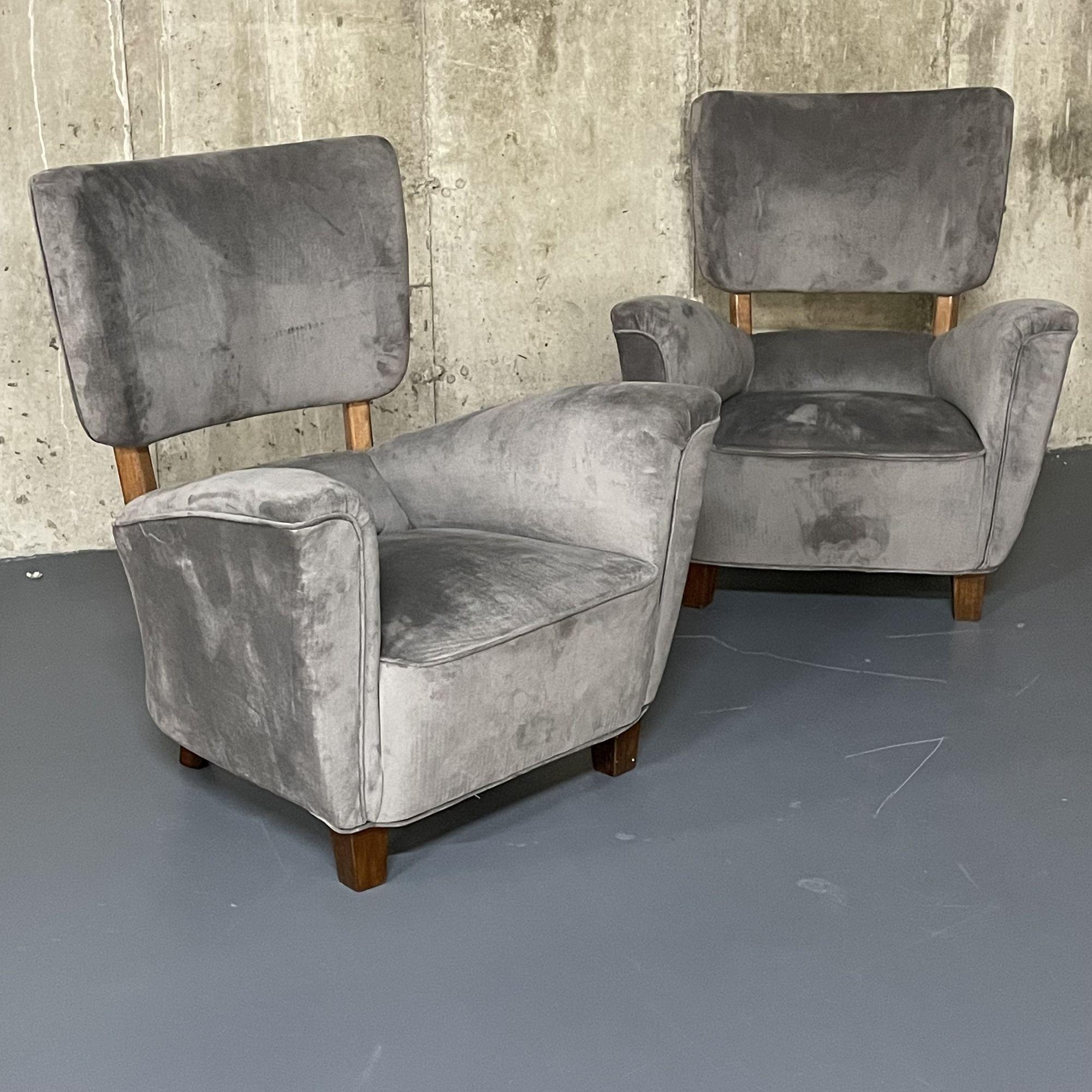 Pair of Italian Mid-Century Modern Hi-Back / Wingback Arm / Lounge Chairs
 
Pair of velvet Italian designer mid-century lounge chairs having exposed wooden supports 
 
Velvet, Walnut
Italy, 1950s
 
Other Italian designers of the period