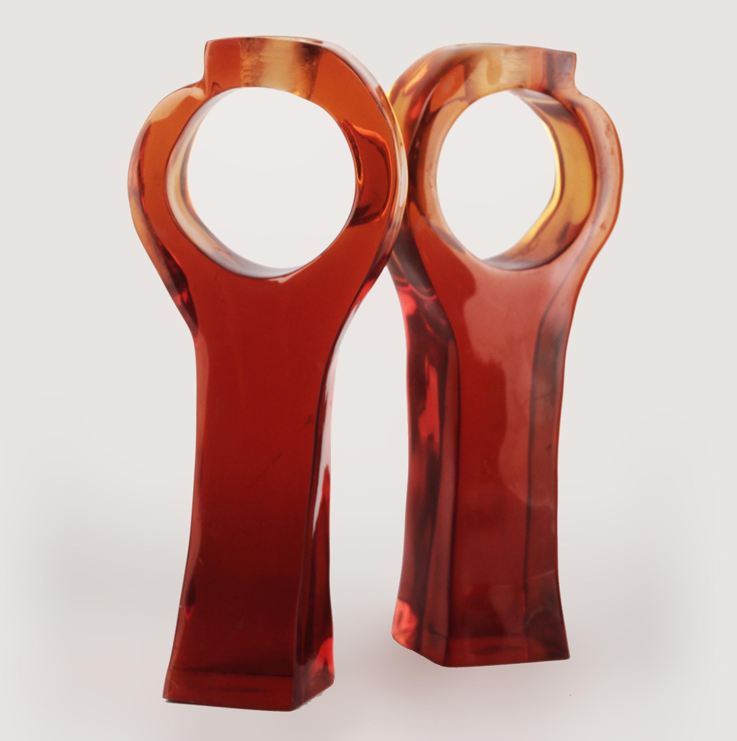 Pair of italian mid-century modern red acrylic/lucite geometric candle holders

By: unknown
Material: acrylic, lucite, synthetic, plastic
Technique: cast, molded, polished, hand-crafted
Dimensions: 3 in x 4.5 in x 11 in
Date: mid-20th century
Style: