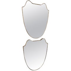 Pair of Italian Mid-Century Modern Sculptural Amorphic Brass Wrapped Mirrors